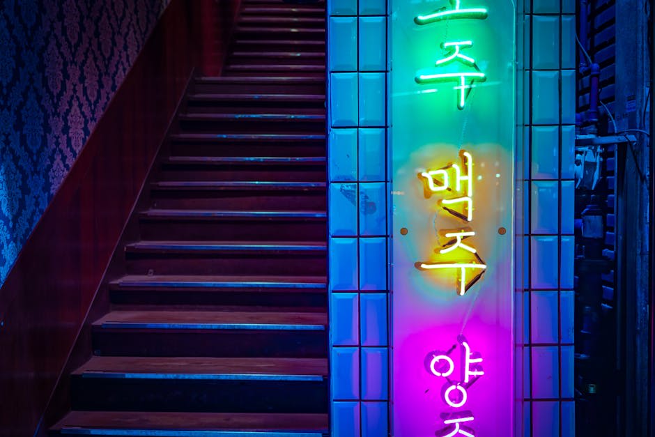 Neon-lit streets of Seoul with vibrant signage at night