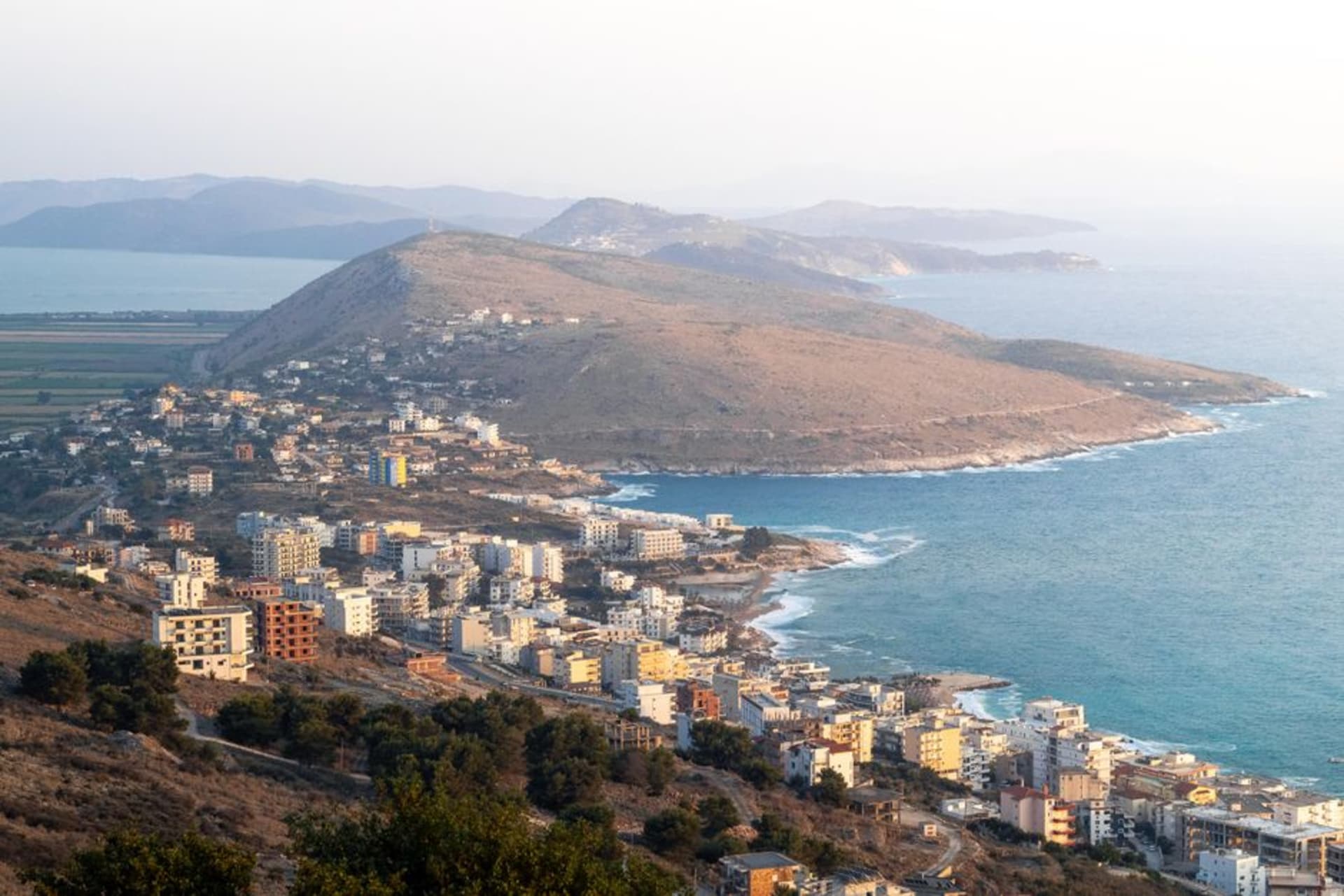 The old hilltop quarter of Himarë overlooking the harbor and the Ionian Sea on Albania's southern Riviera.