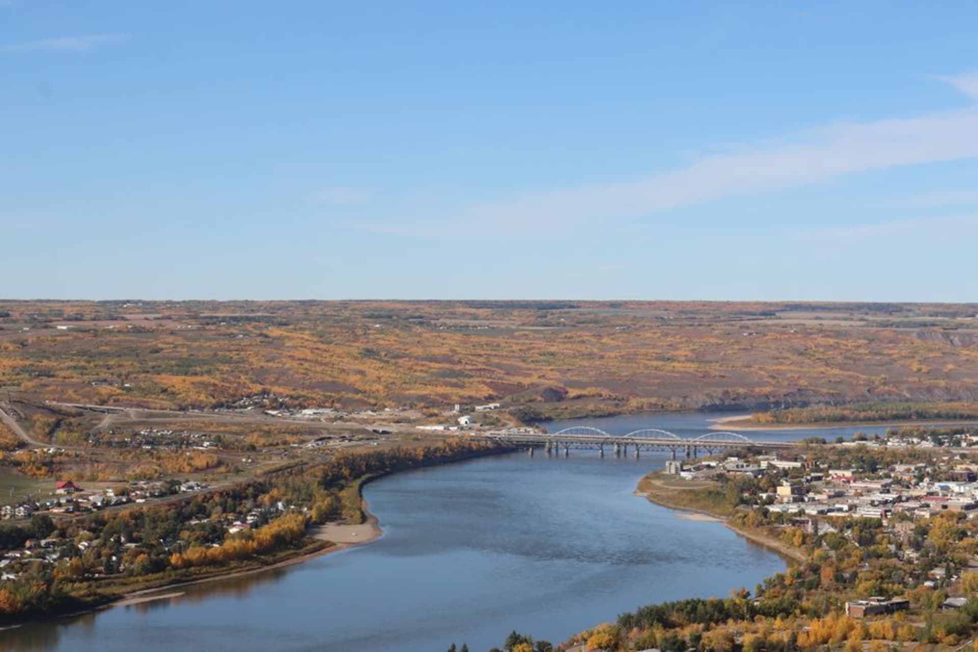The South Saskatchewan River winding through the deep valley at Medicine Hat, Alberta, with prairie bluffs rising on either side