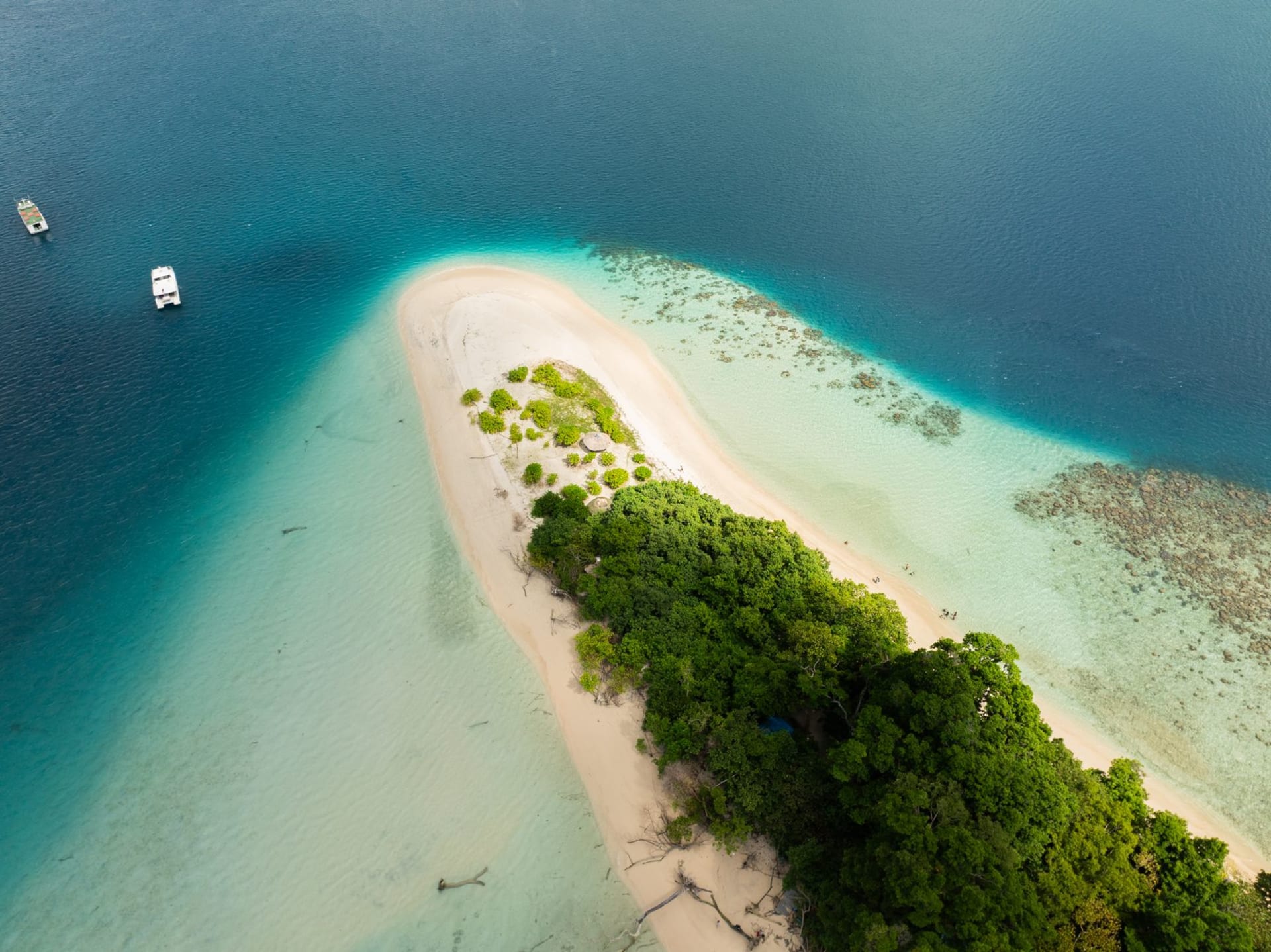 Aerial view of Jolly Buoy Island in the Andaman Sea showing white sandy beach and brilliant turquoise water