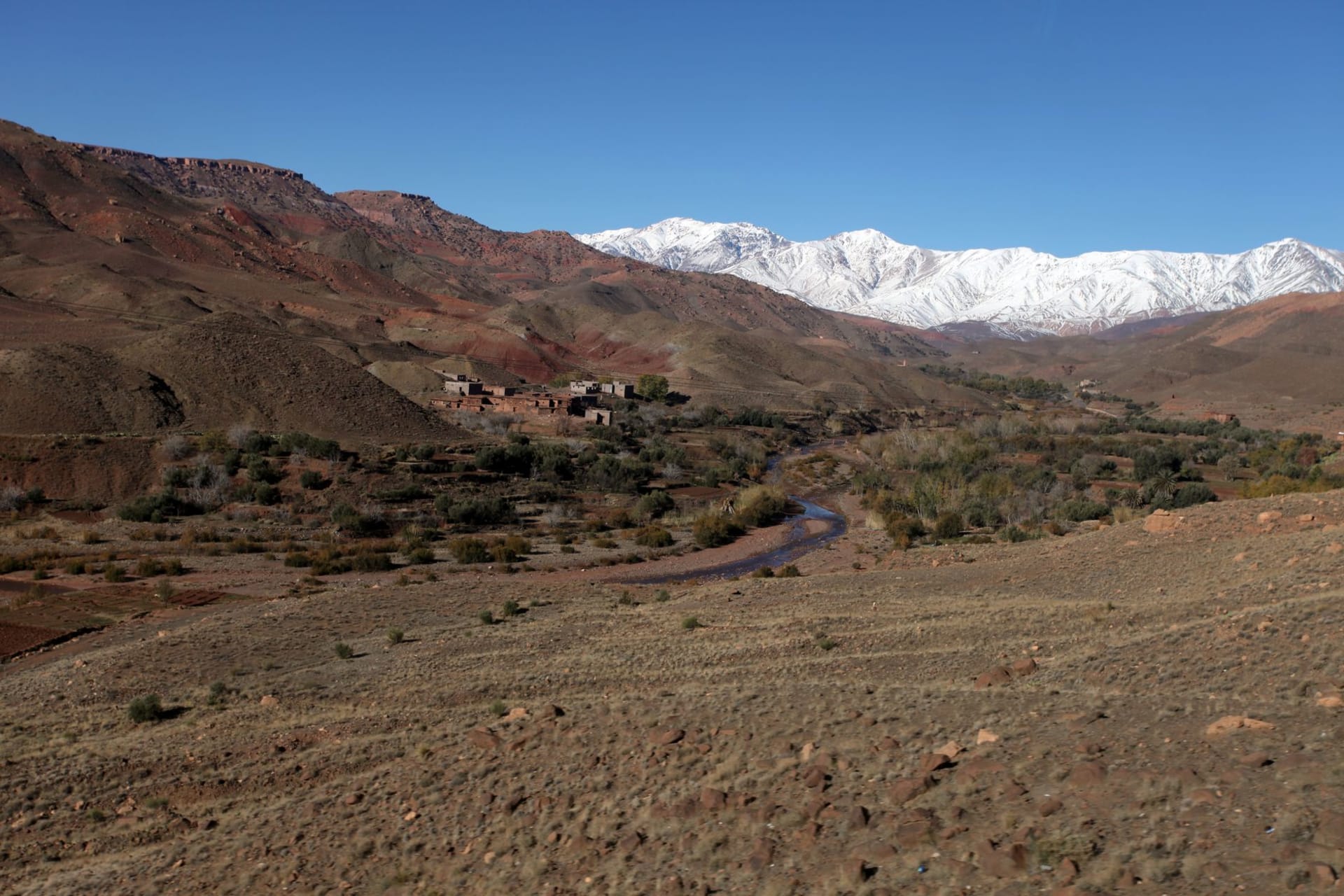 Imilchil plateau with the twin lakes of Islit and Tislit visible, treeless high-altitude landscape under wide open sky