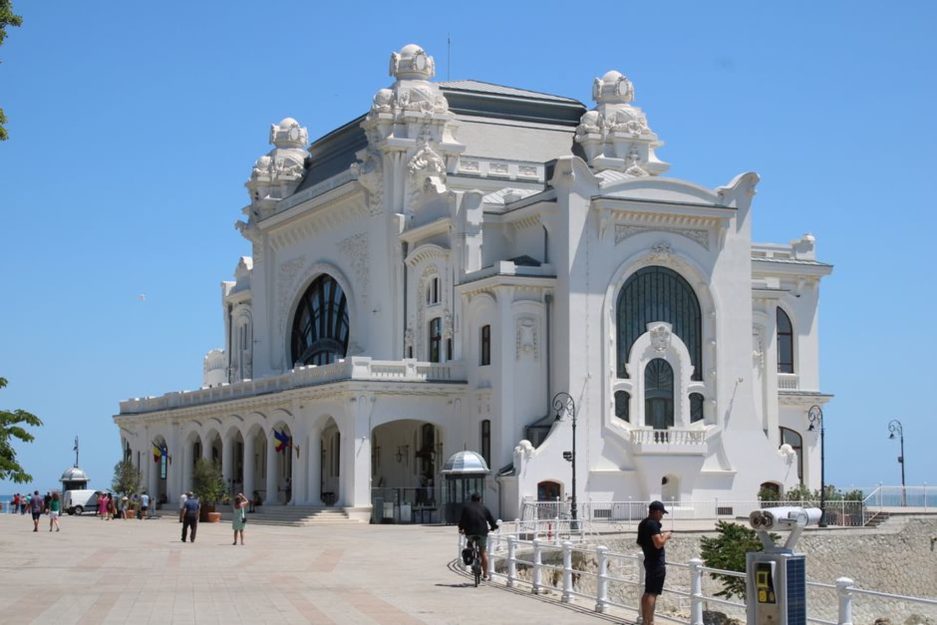 The Art Nouveau facade of the Constanța Casino at dusk, overlooking the Black Sea