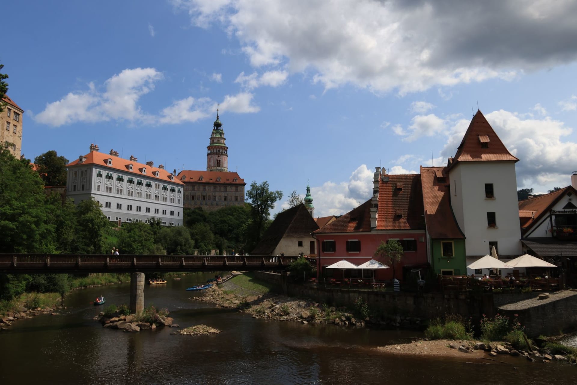 Český Krumlov Castle and the medieval town curving around the Vltava River on a clear sunny day