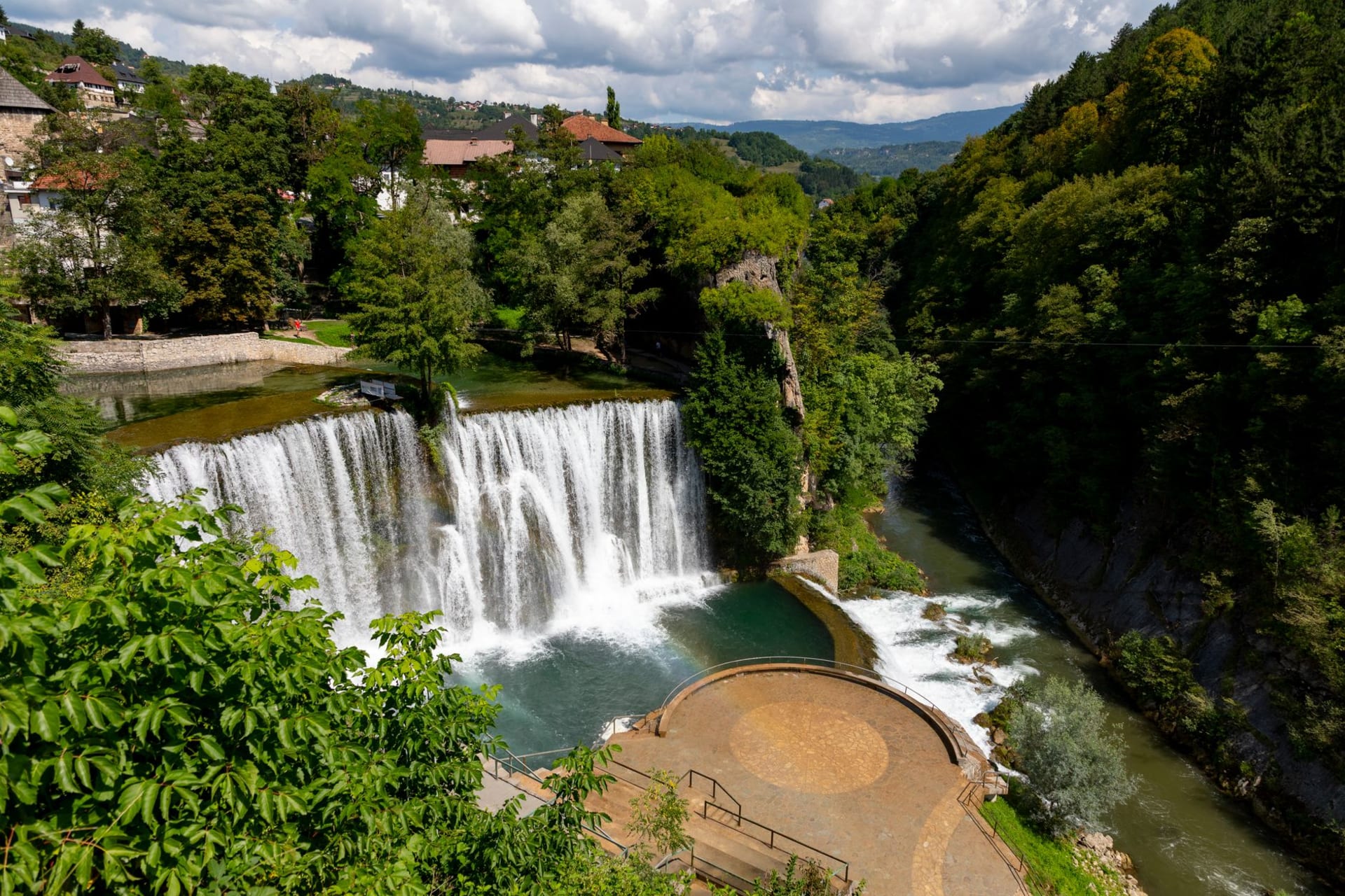 The Pliva waterfall cascading into the Vrbas river at the centre of Jajce, the medieval fortress on the hill rising above