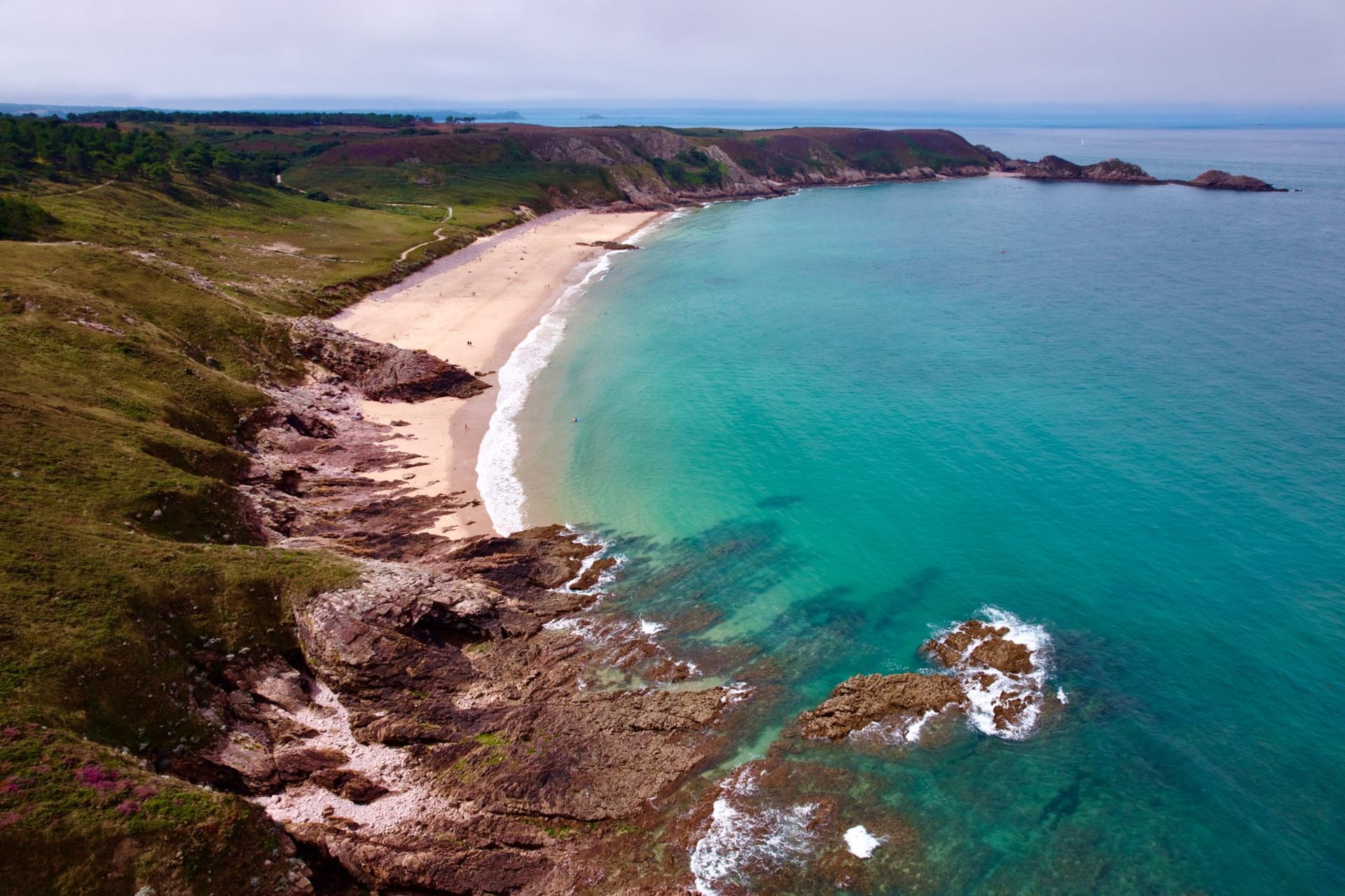 Dramatic sandstone sea cliffs at Pointe de Pen-Hir on the Crozon Peninsula, Brittany, above churning Atlantic waves