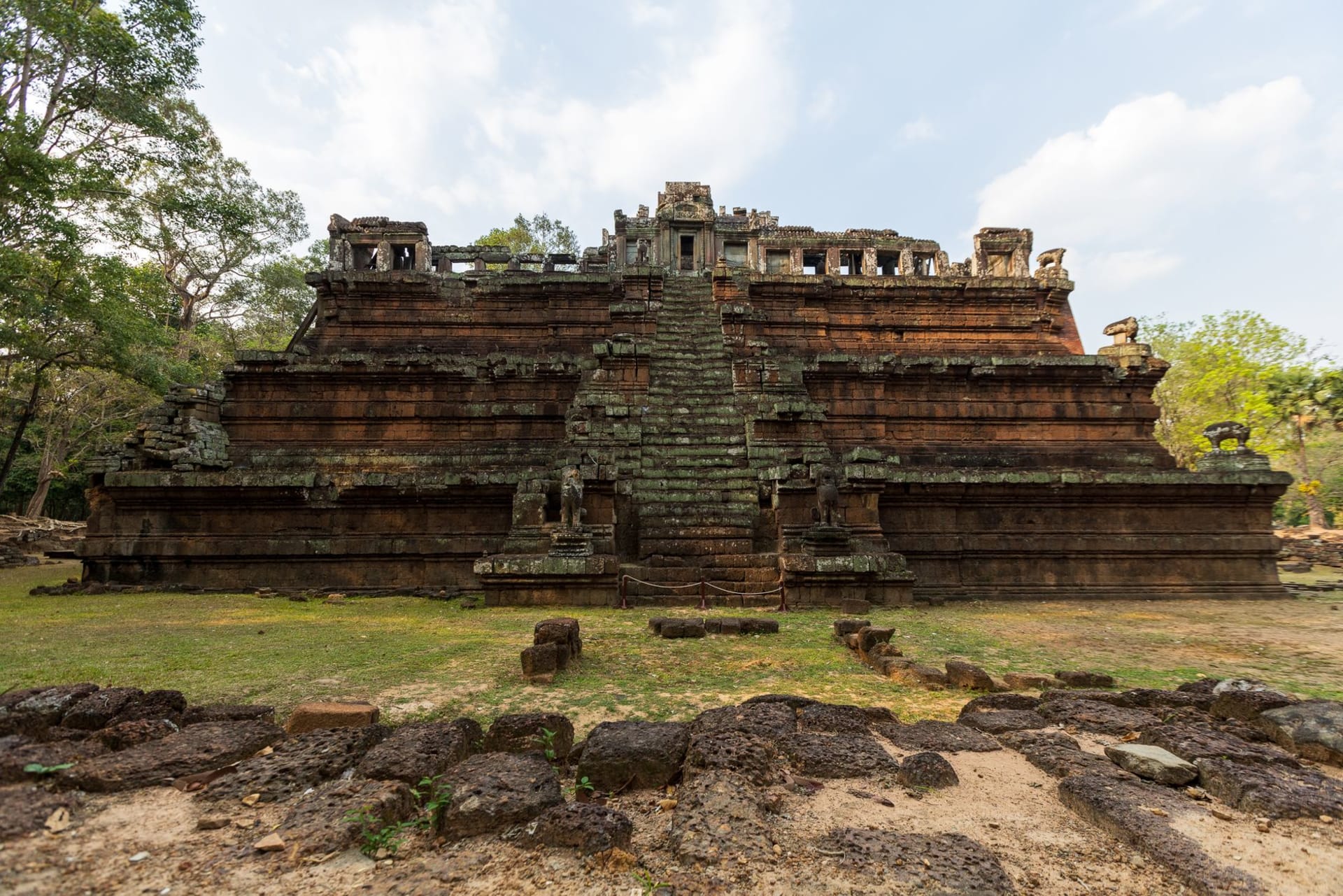 The seven-tiered sandstone pyramid of Prasat Thom rising above the jungle canopy at Koh Ker, northern Cambodia