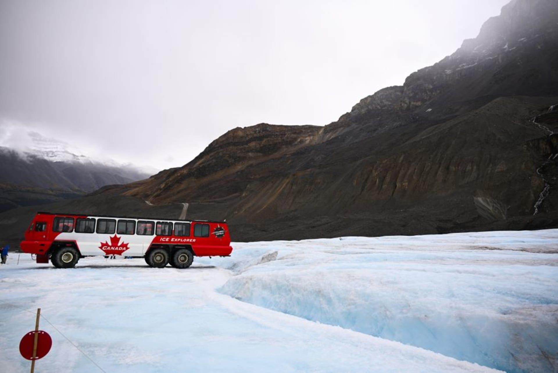 Wide view of the Athabasca Glacier flowing down from the Columbia Icefield toward the Icefields Parkway