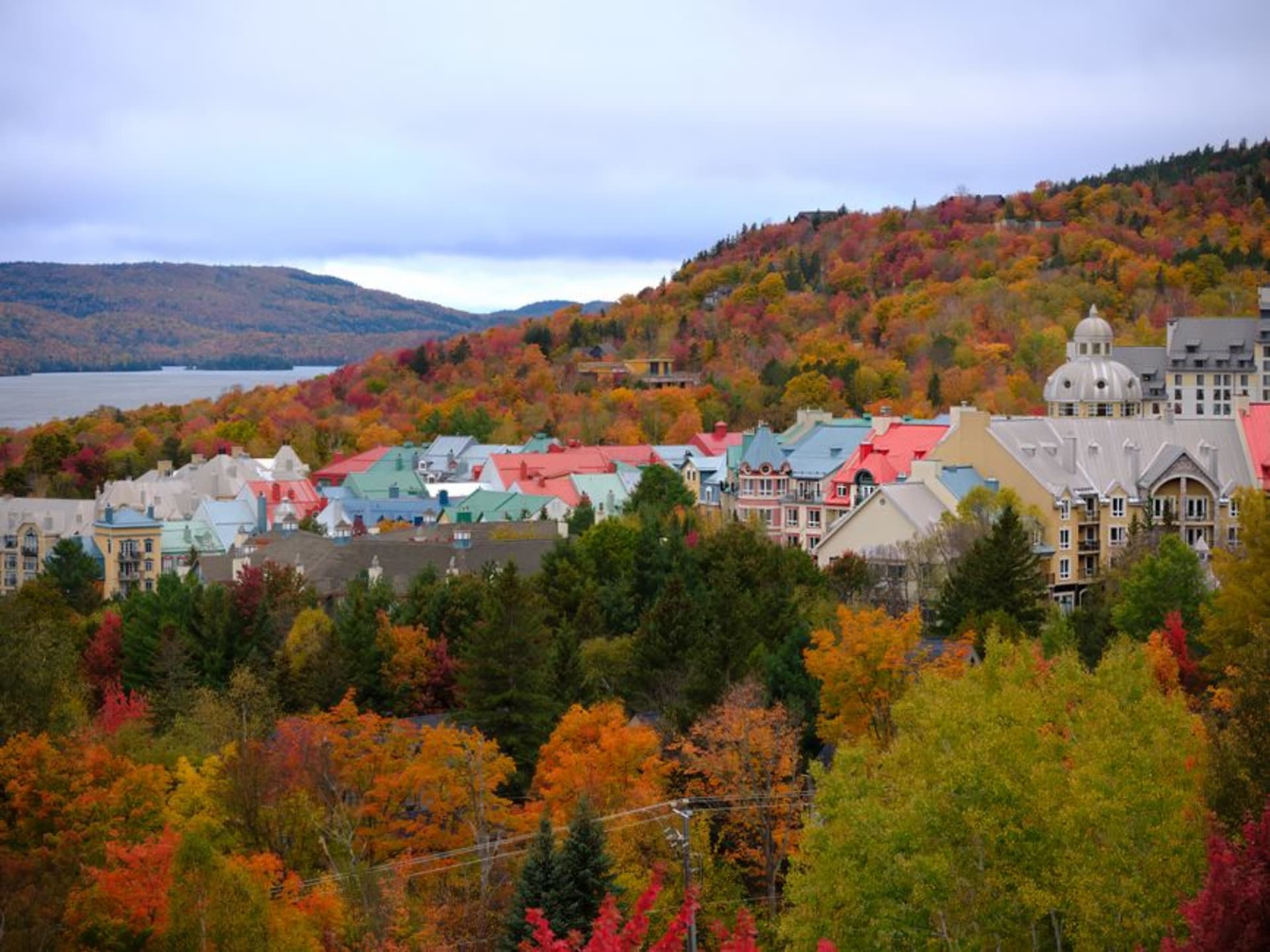 Rolling autumn hills and a covered bridge in Quebec's Eastern Townships