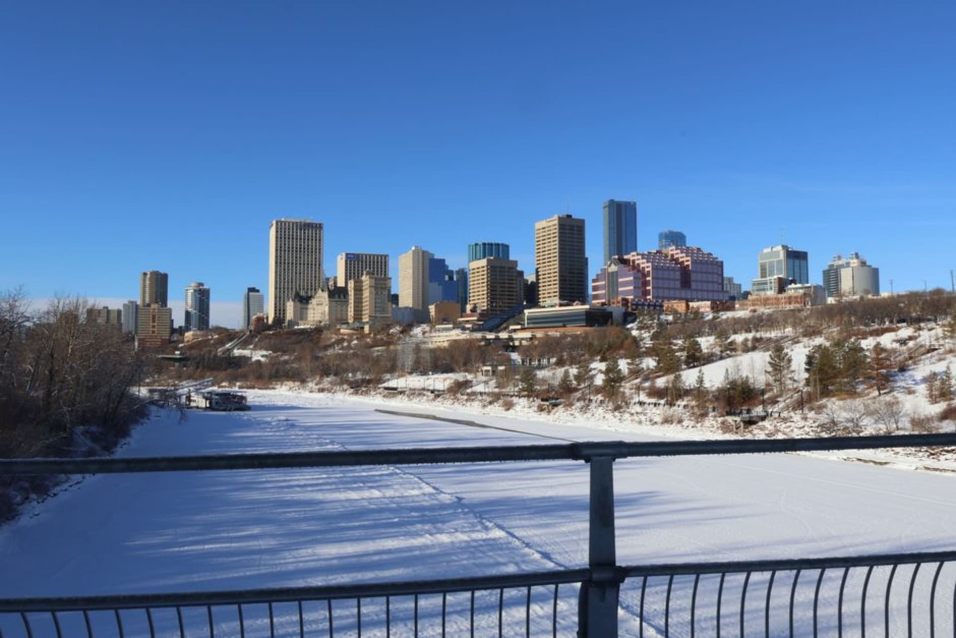 The North Saskatchewan River valley parkland winding through downtown Edmonton