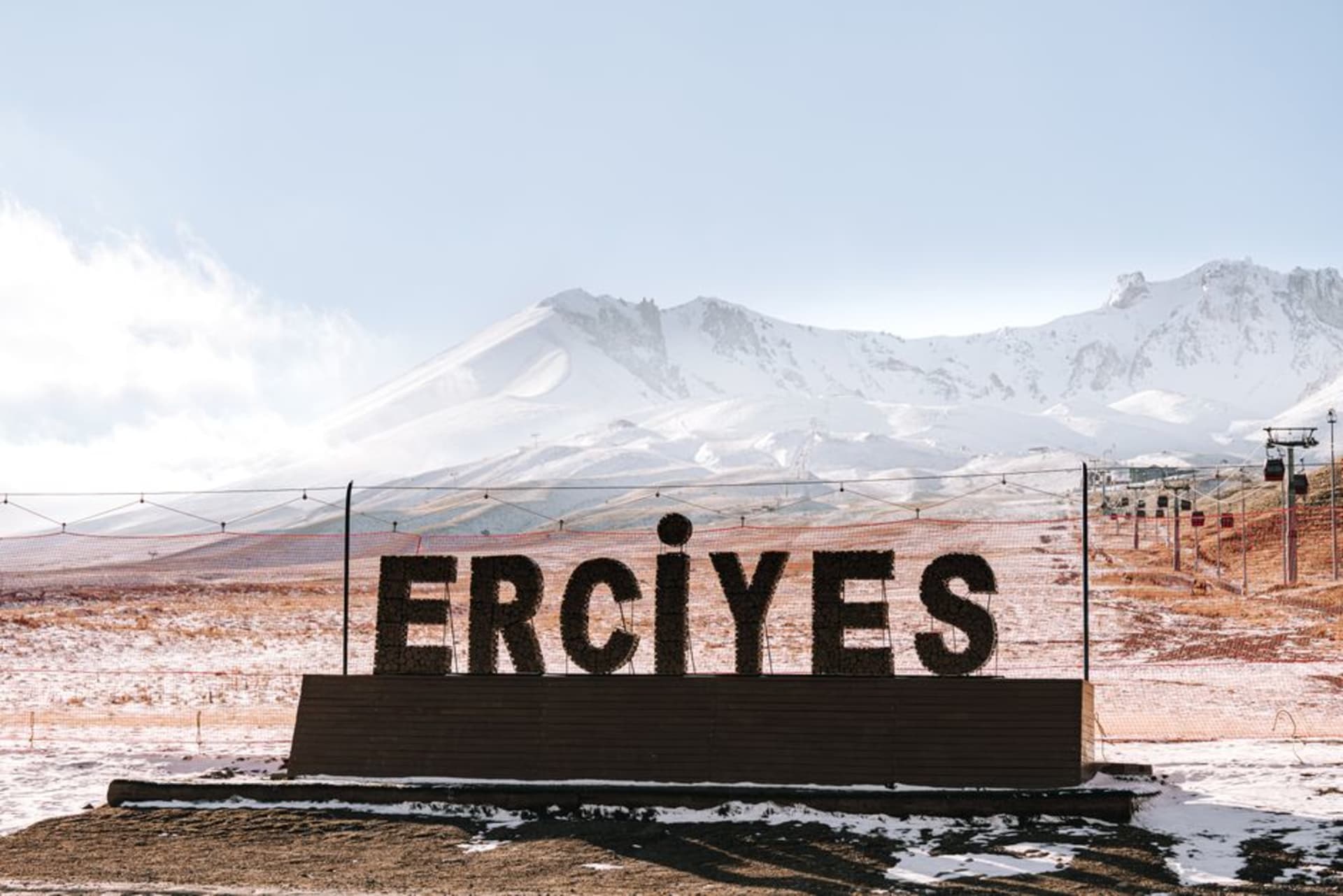 The snow-capped, symmetrical cone of Erciyes volcano rising above the Anatolian plateau south of Cappadocia
