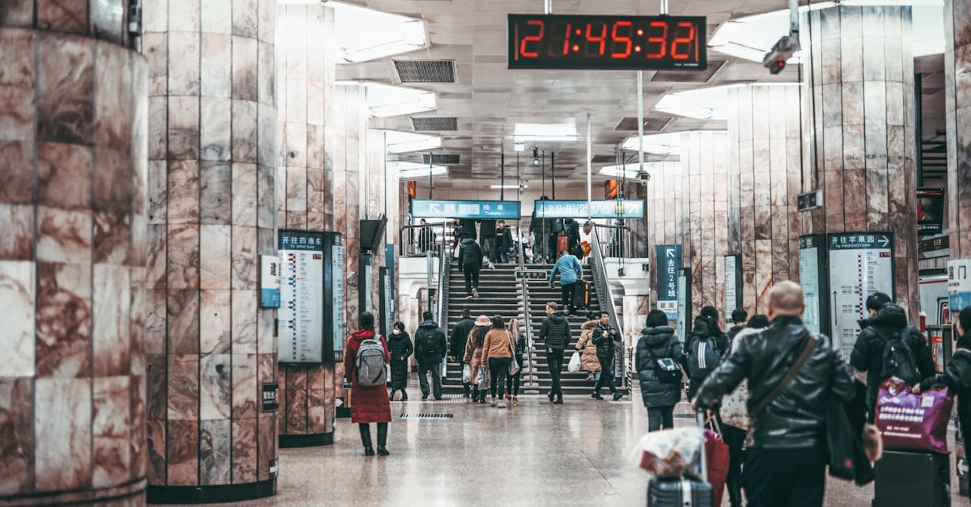 The Forbidden City rooftops stretching toward the modern Beijing skyline