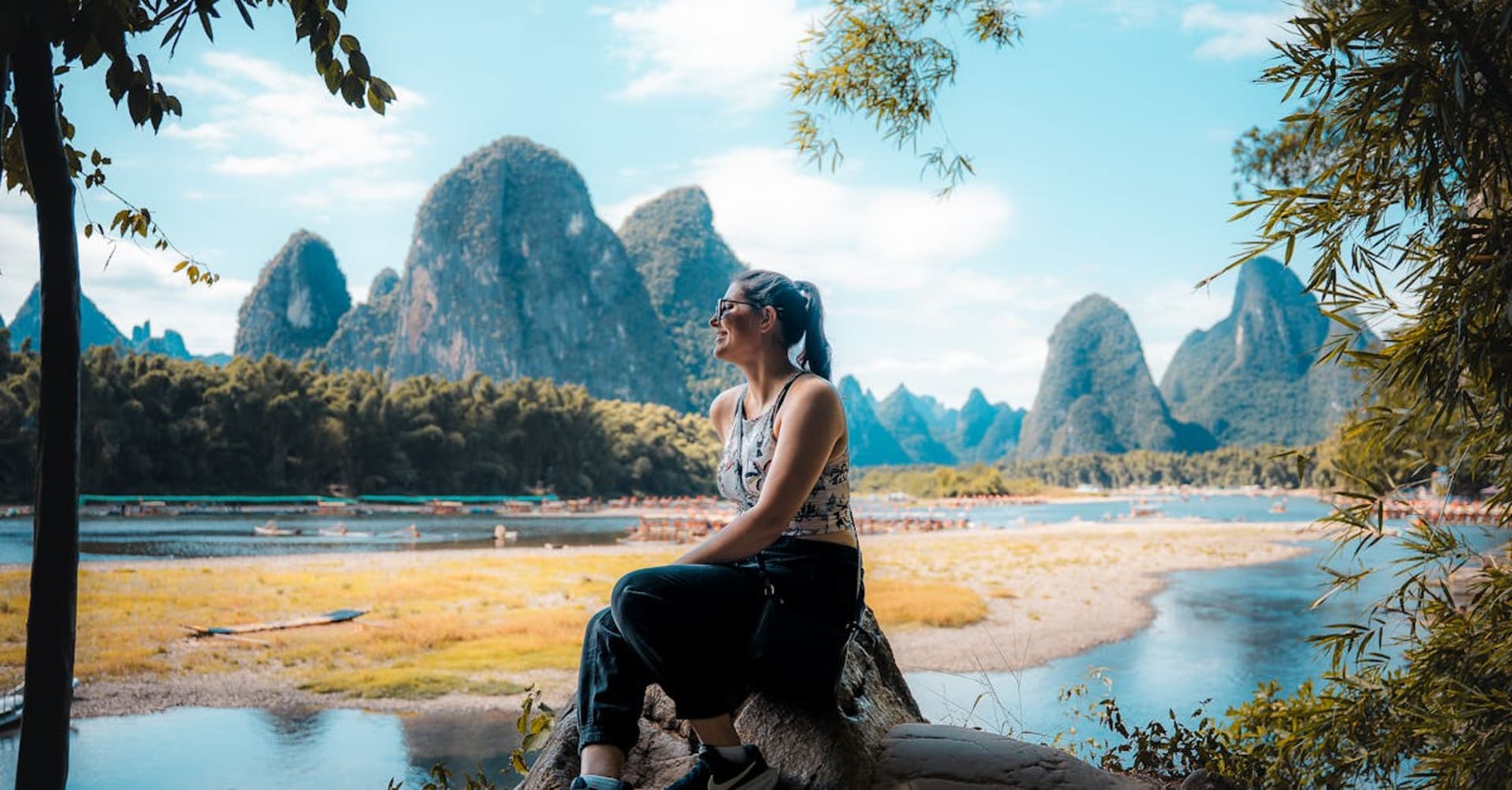 Karst mountains reflected in the still waters of the Li River near Guilin