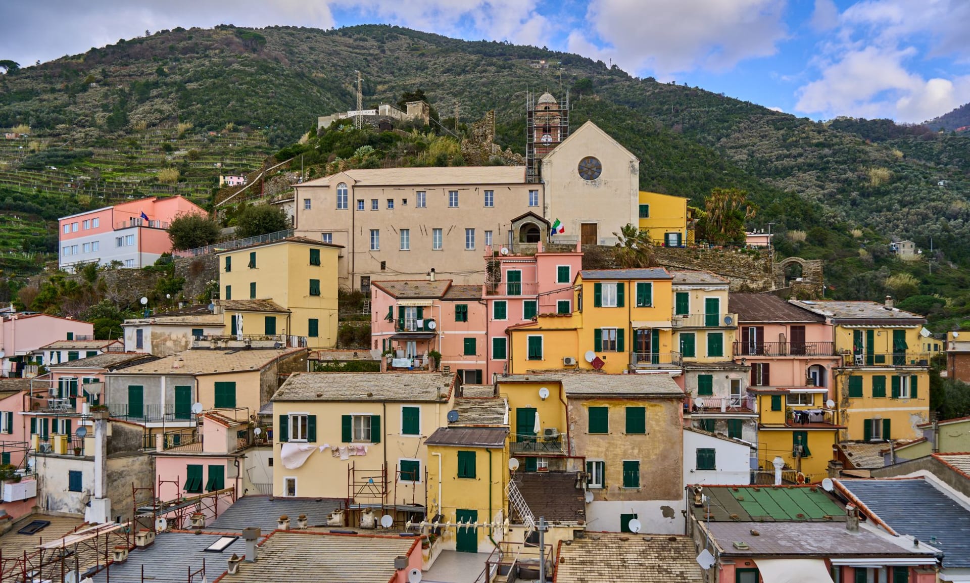 The Sanctuary of Montenero perched on the ridge above Riomaggiore with the Ligurian coast falling away to the sea