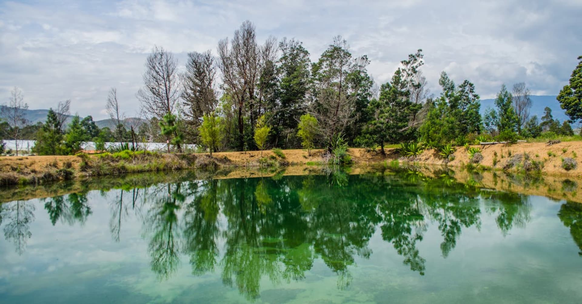 Whitewashed colonial buildings surrounding Villa de Leyva's vast cobblestone plaza