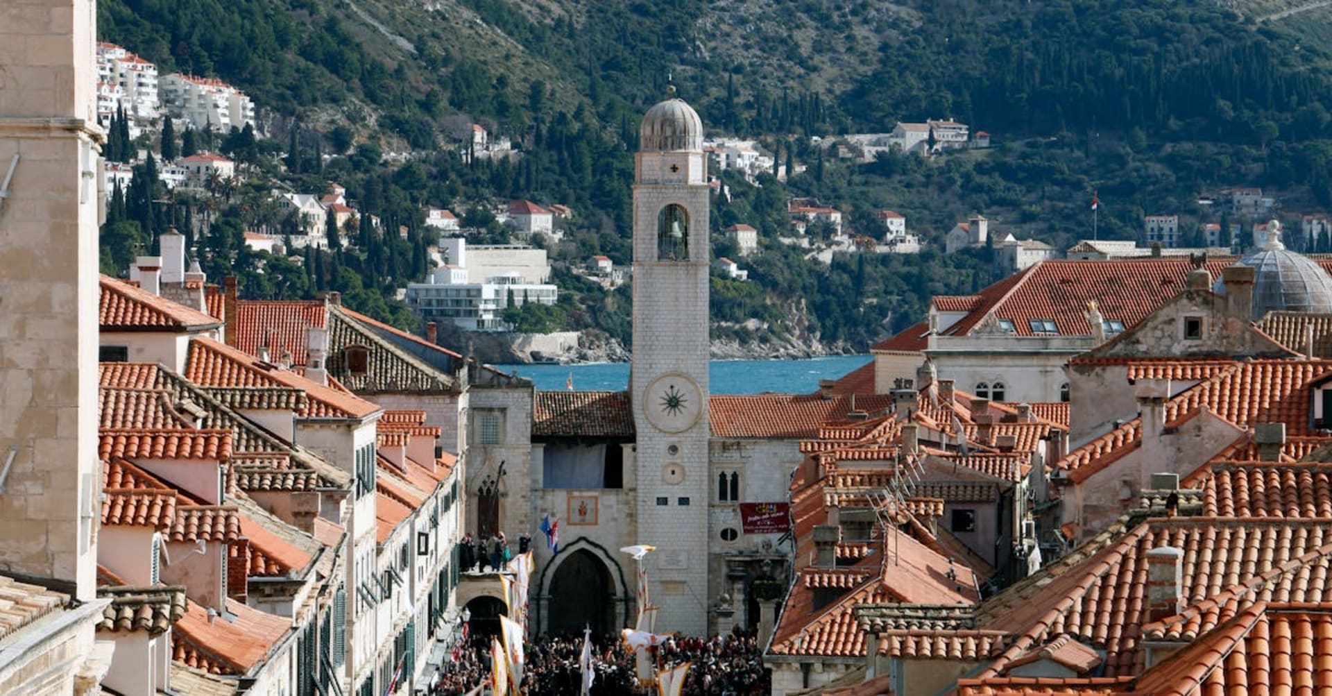 The terracotta rooftops of Dubrovnik's Old Town seen from the city walls above the Adriatic