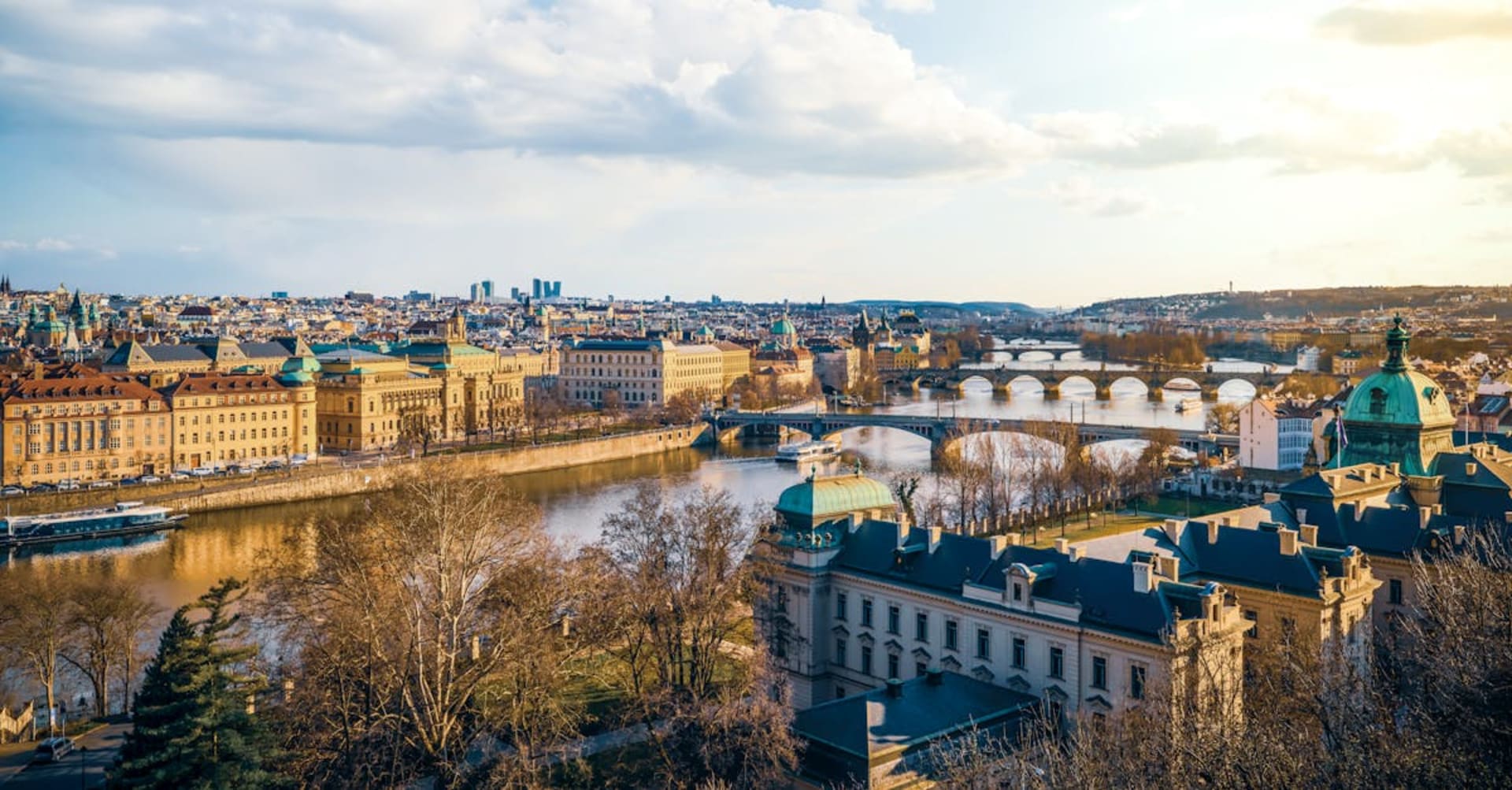 The Pravčická Brána natural sandstone arch surrounded by autumn forest in Bohemian Switzerland