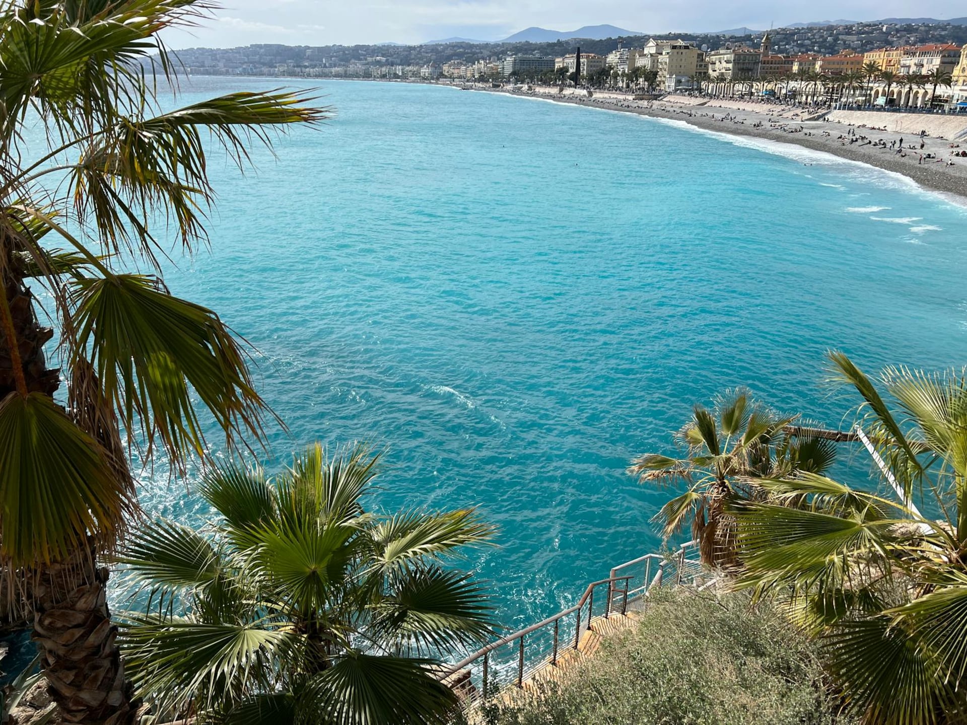 The turquoise Mediterranean coast of the French Riviera with terracotta rooftops