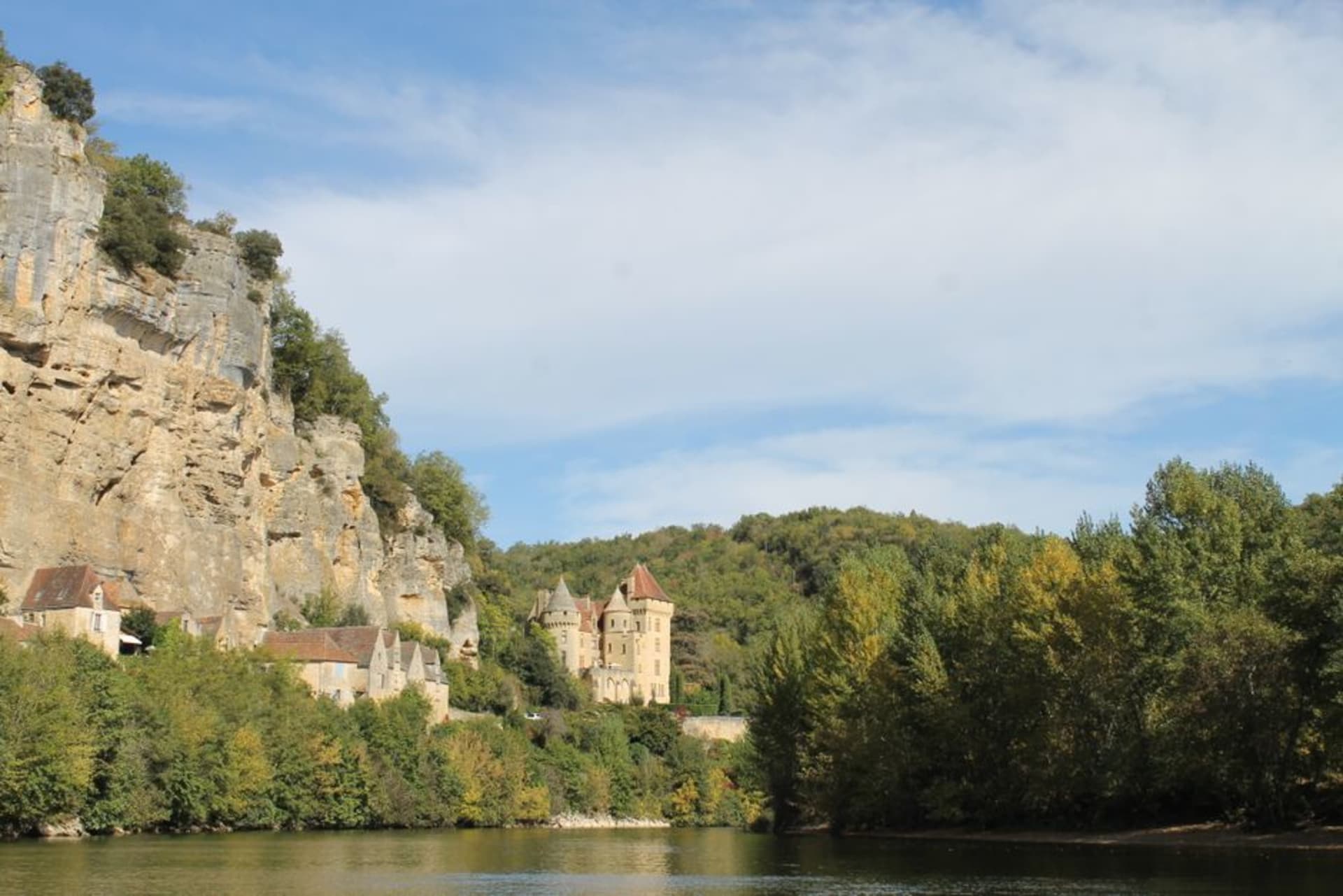 The three medieval towers of Château de Foix perched on a rocky outcrop above the town and the Ariège river