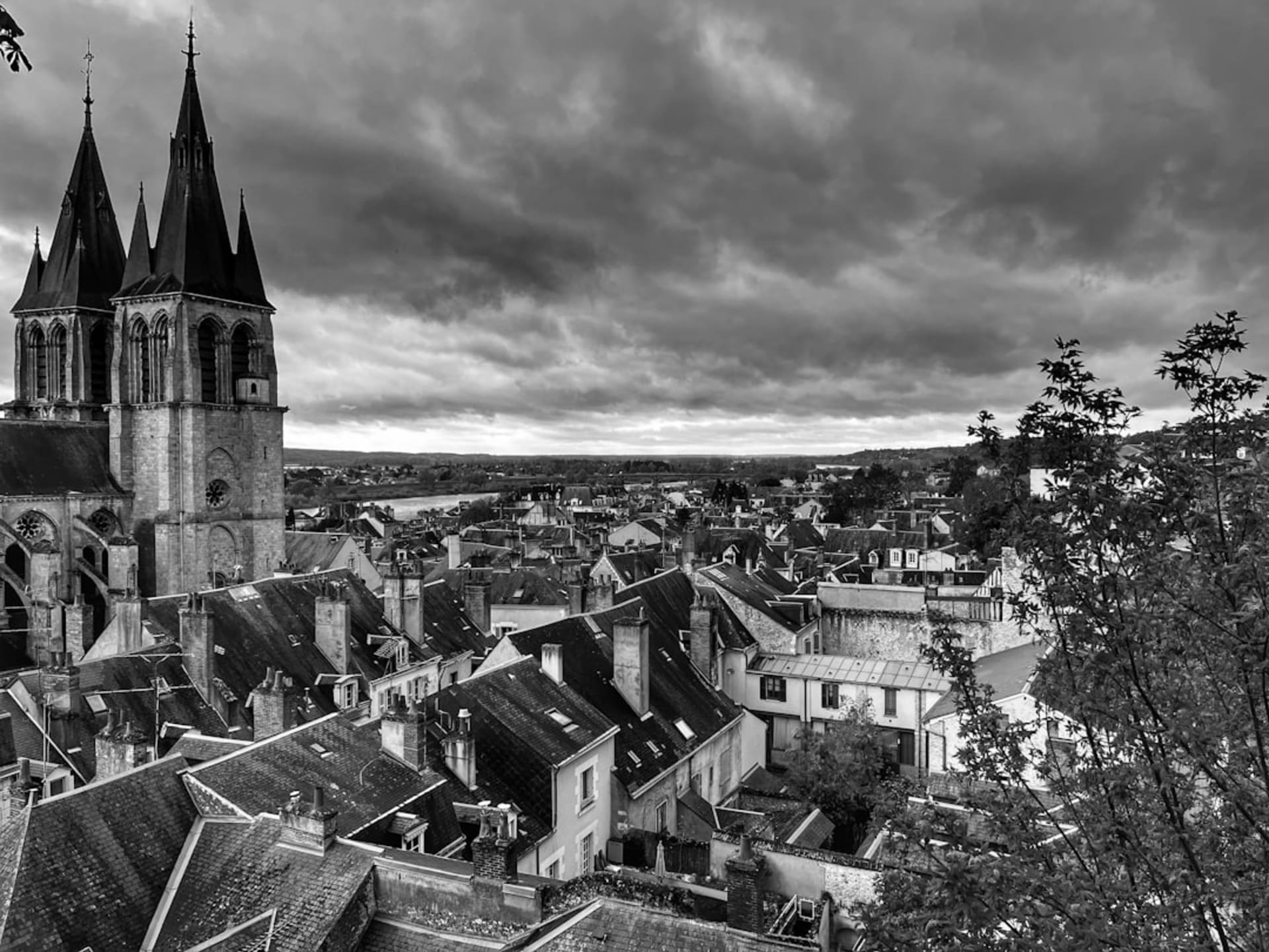 The white multi-domed towers of Cathédrale Saint-Front rising over the old rooftops of Périgueux