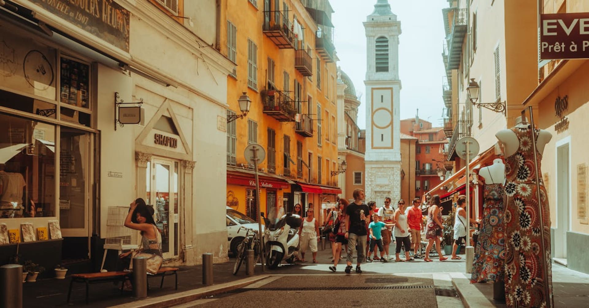 Lavender fields stretching toward a hilltop village in Provence