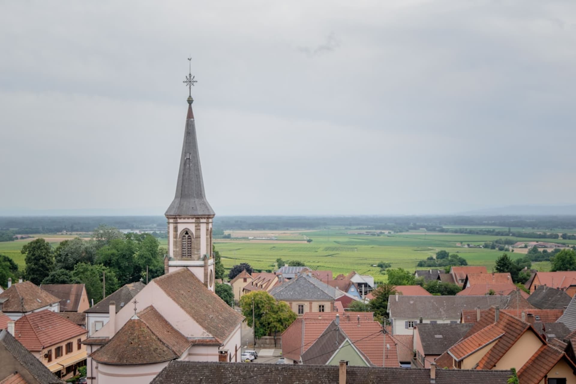 The stone ramparts and defensive towers of the medieval walled town of Provins under a clear sky