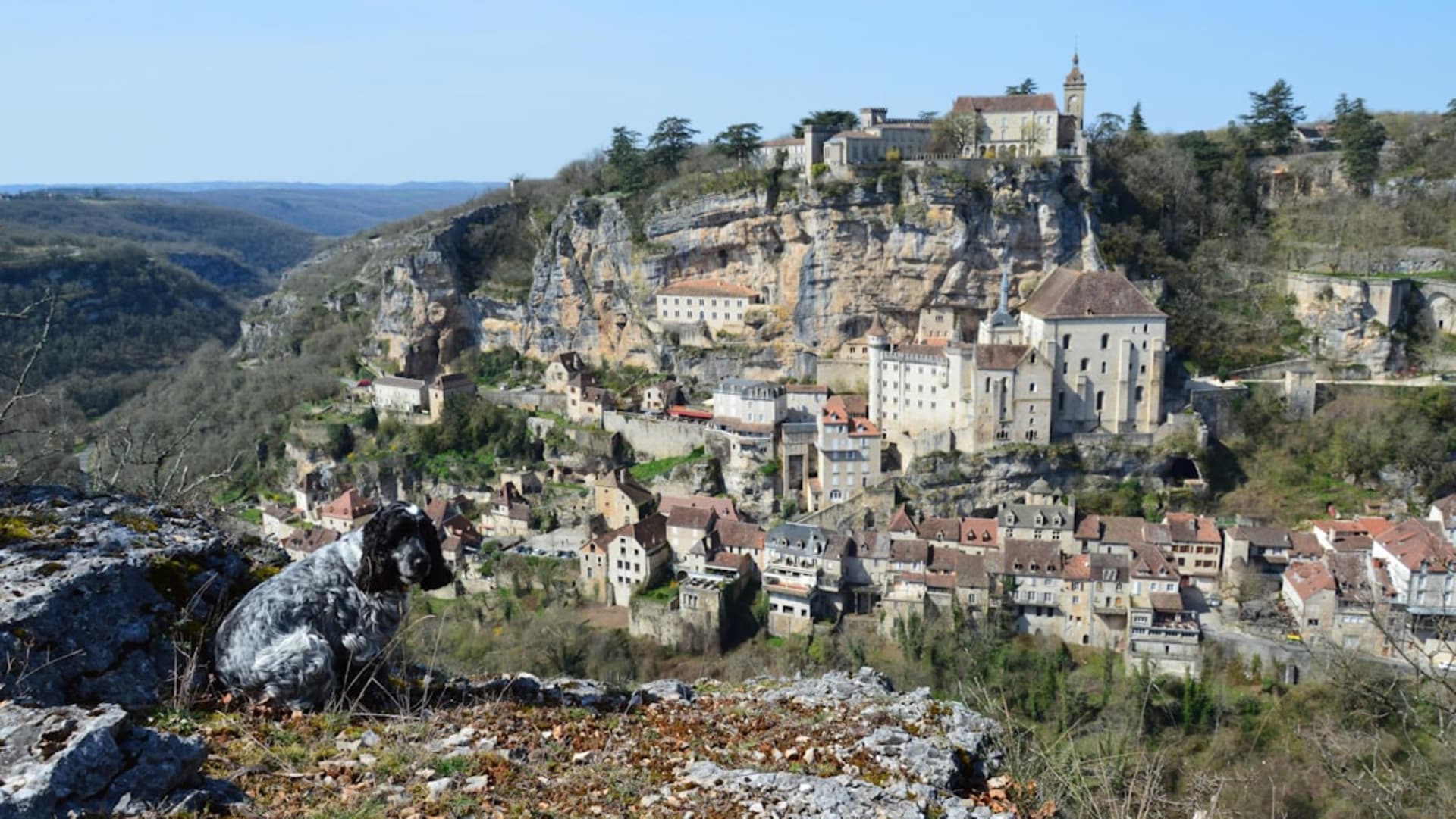 The medieval village and sanctuary of Rocamadour built into a sheer cliff face above the Alzou gorge