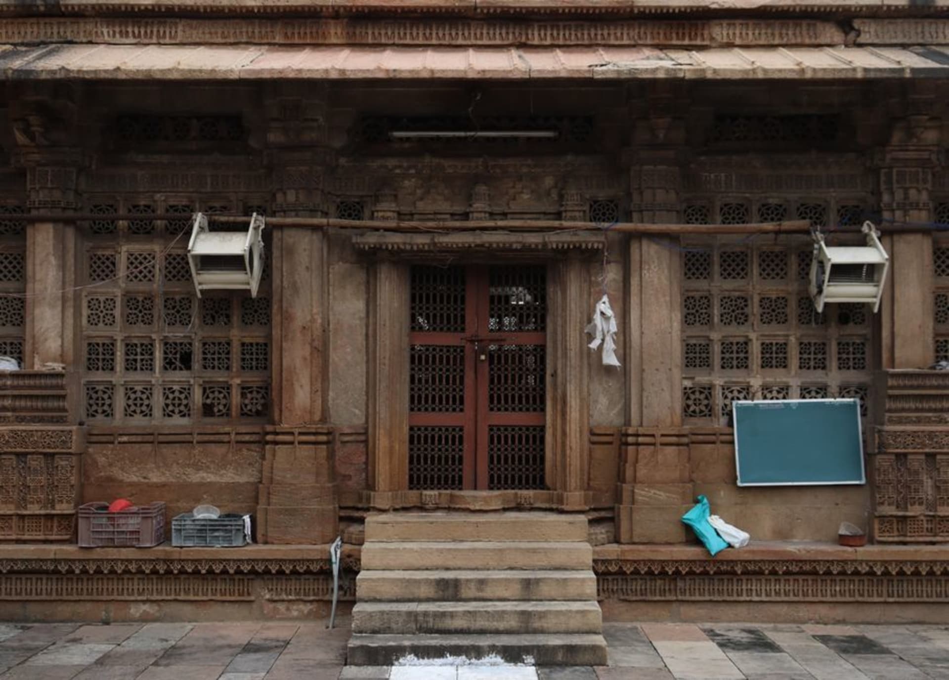 Carved wooden facades of a traditional pol house neighborhood in Ahmedabad's old city
