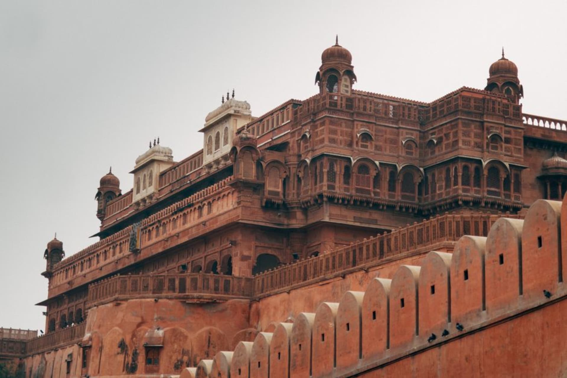 The red sandstone ramparts of Junagarh Fort under a wide desert sky