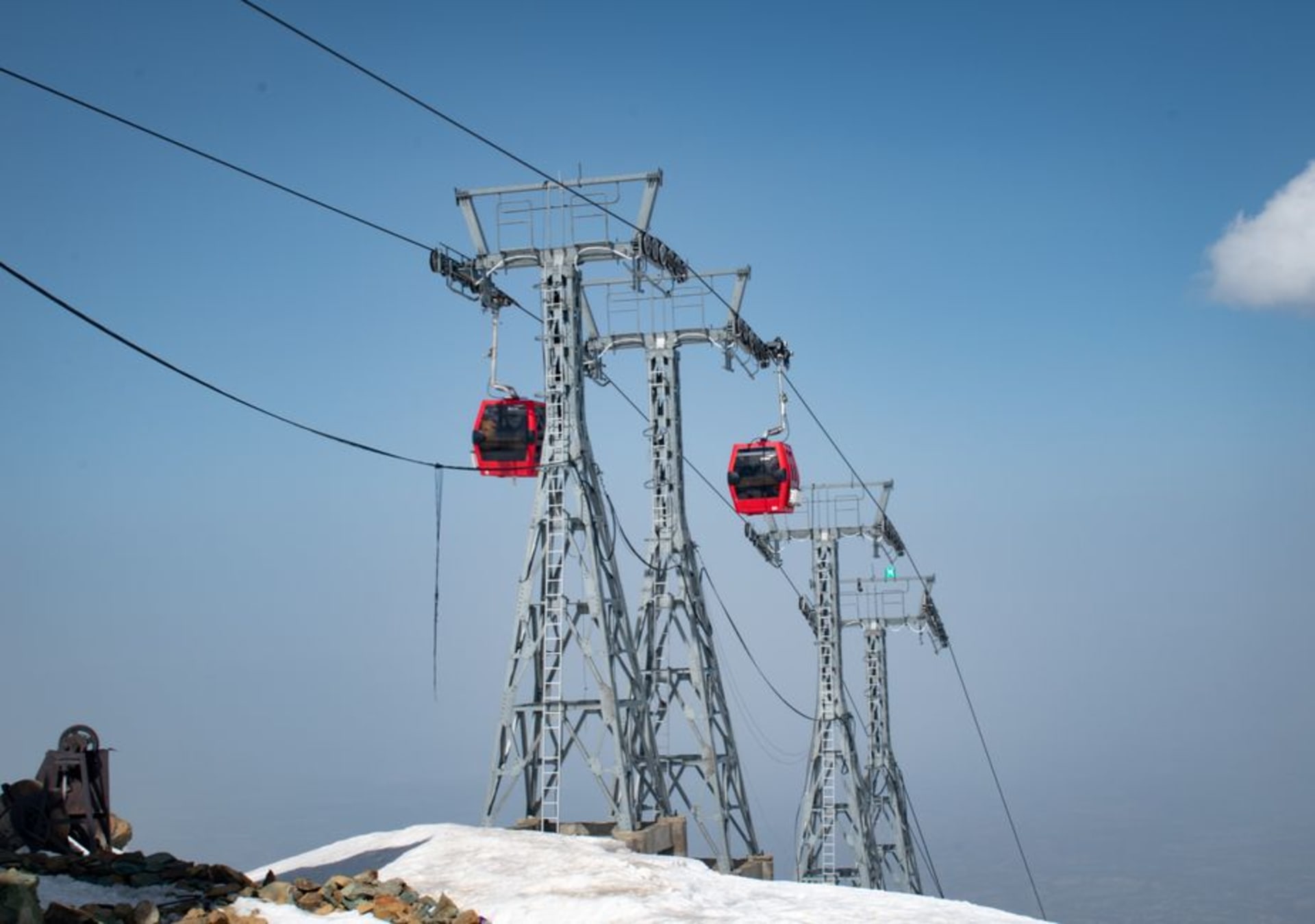 Snow-covered slopes of Gulmarg with the Gondola cable car line running up the mountain