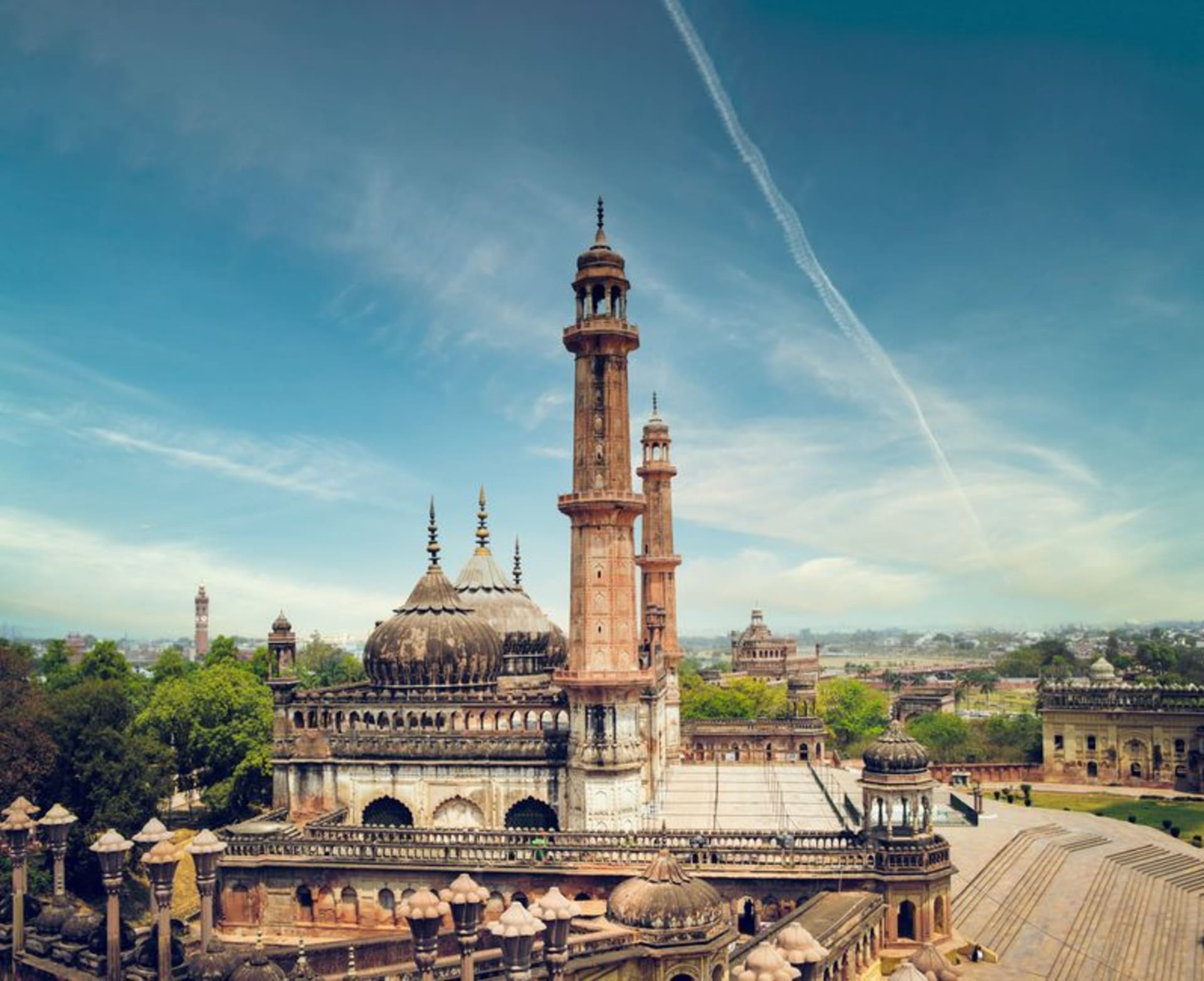 The grand facade of Bara Imambara glowing at dusk in Lucknow