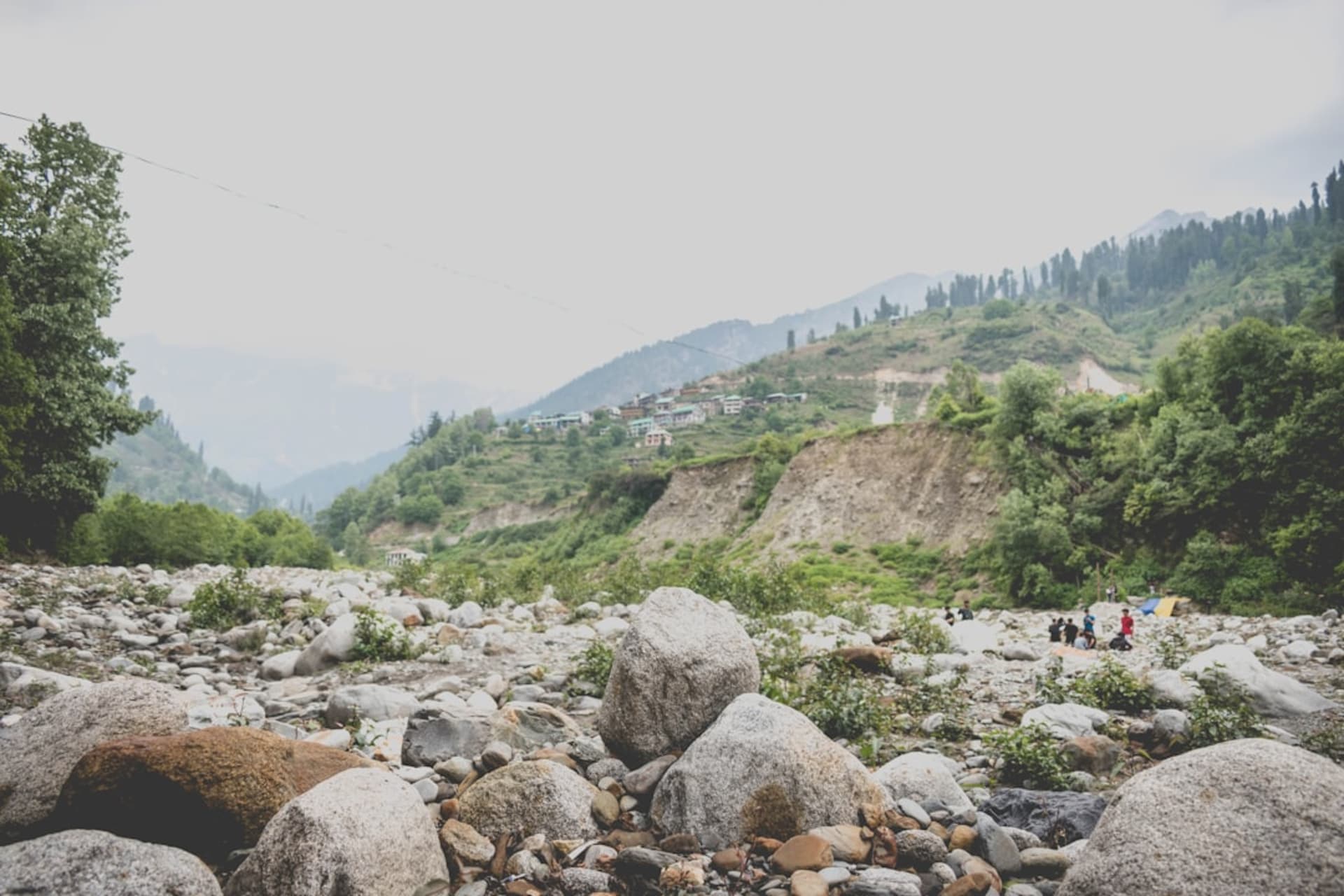 The Beas river valley in Manali surrounded by snow-capped Himalayan peaks