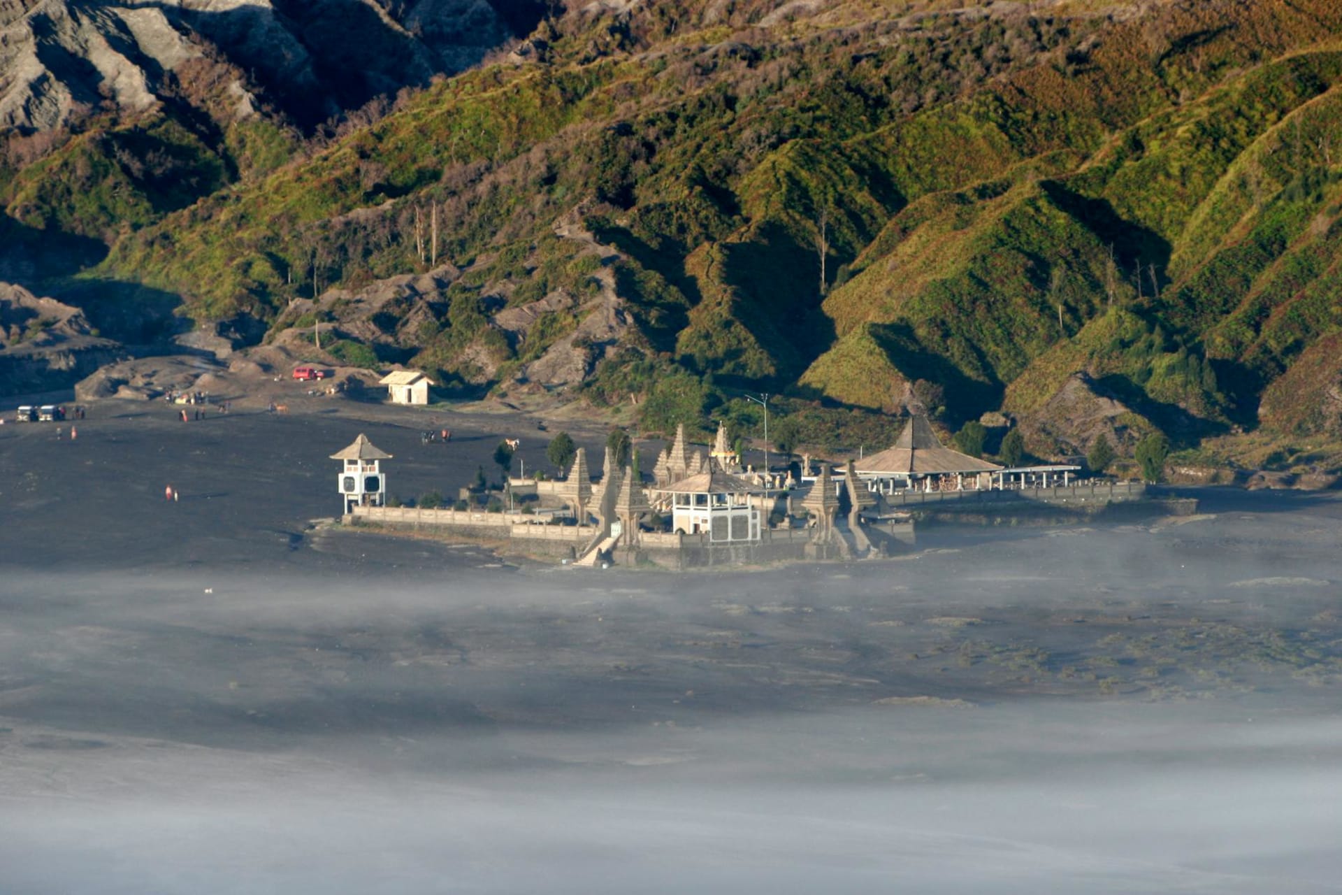 Volcanic landscape of Java with lush tropical vegetation and misty peaks