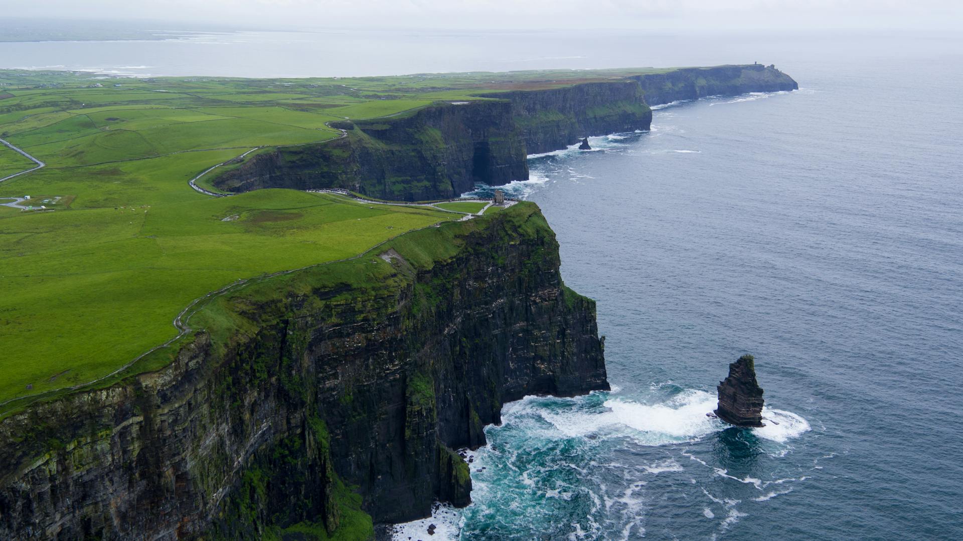 Dramatic sea cliffs along the Wild Atlantic Way under moody skies