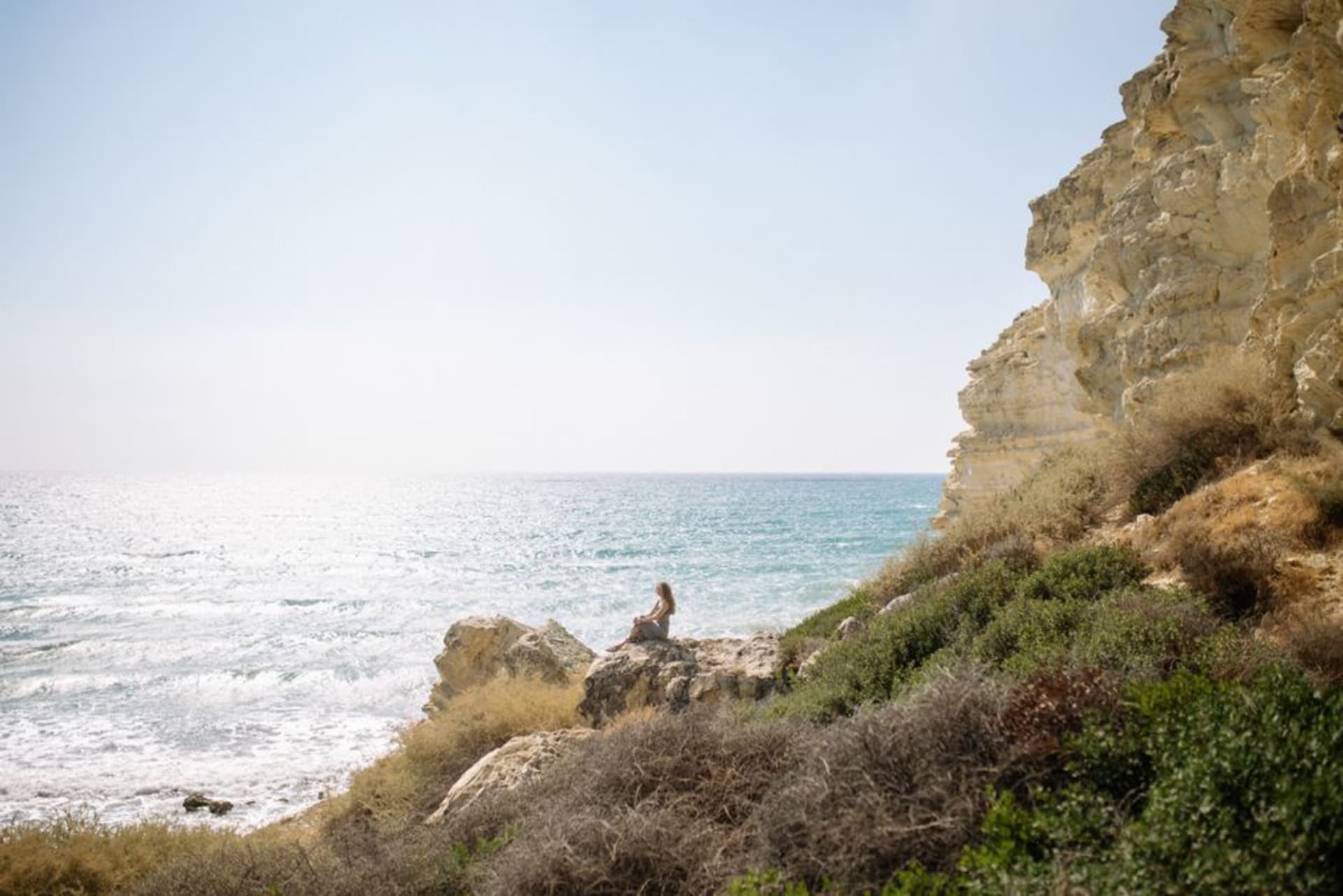 White chalk cliffs of Rosh Hanikra dropping into the turquoise Mediterranean Sea at the Israel-Lebanon border