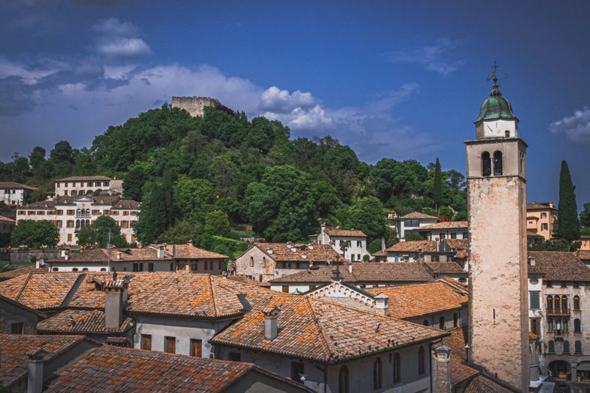 The hilltop town of Asolo with its medieval towers and rolling Veneto hills behind