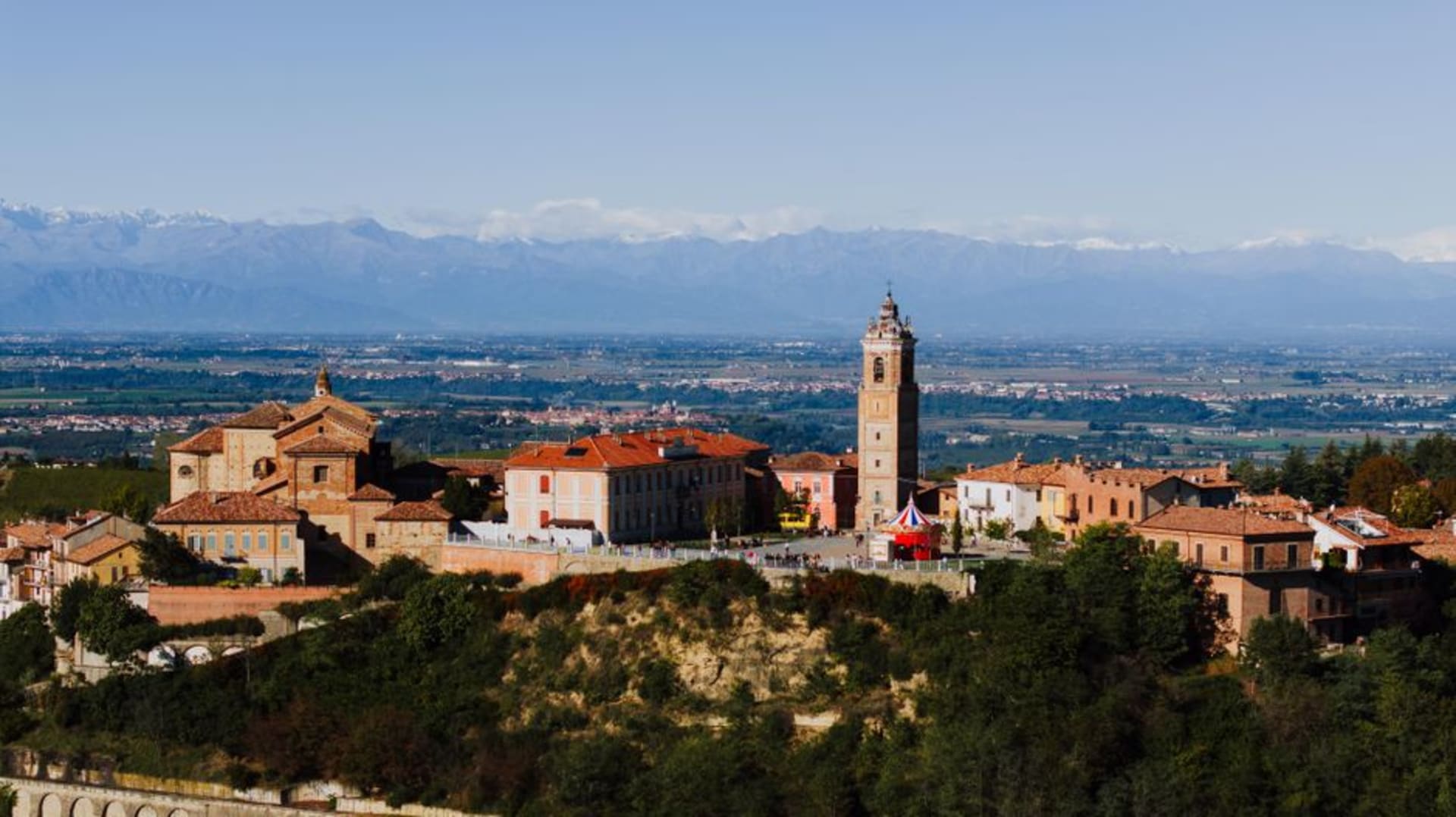 The medieval towers of Asti rising above the Piedmont rooftops at dusk