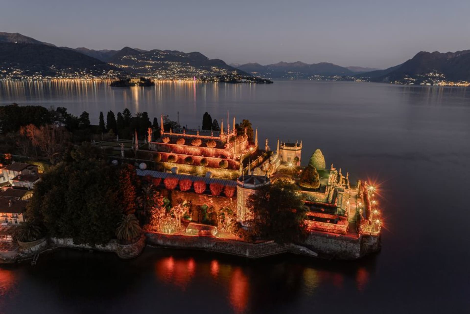 The lakefront promenade of Stresa on Lake Maggiore with the Borromean Islands in the distance