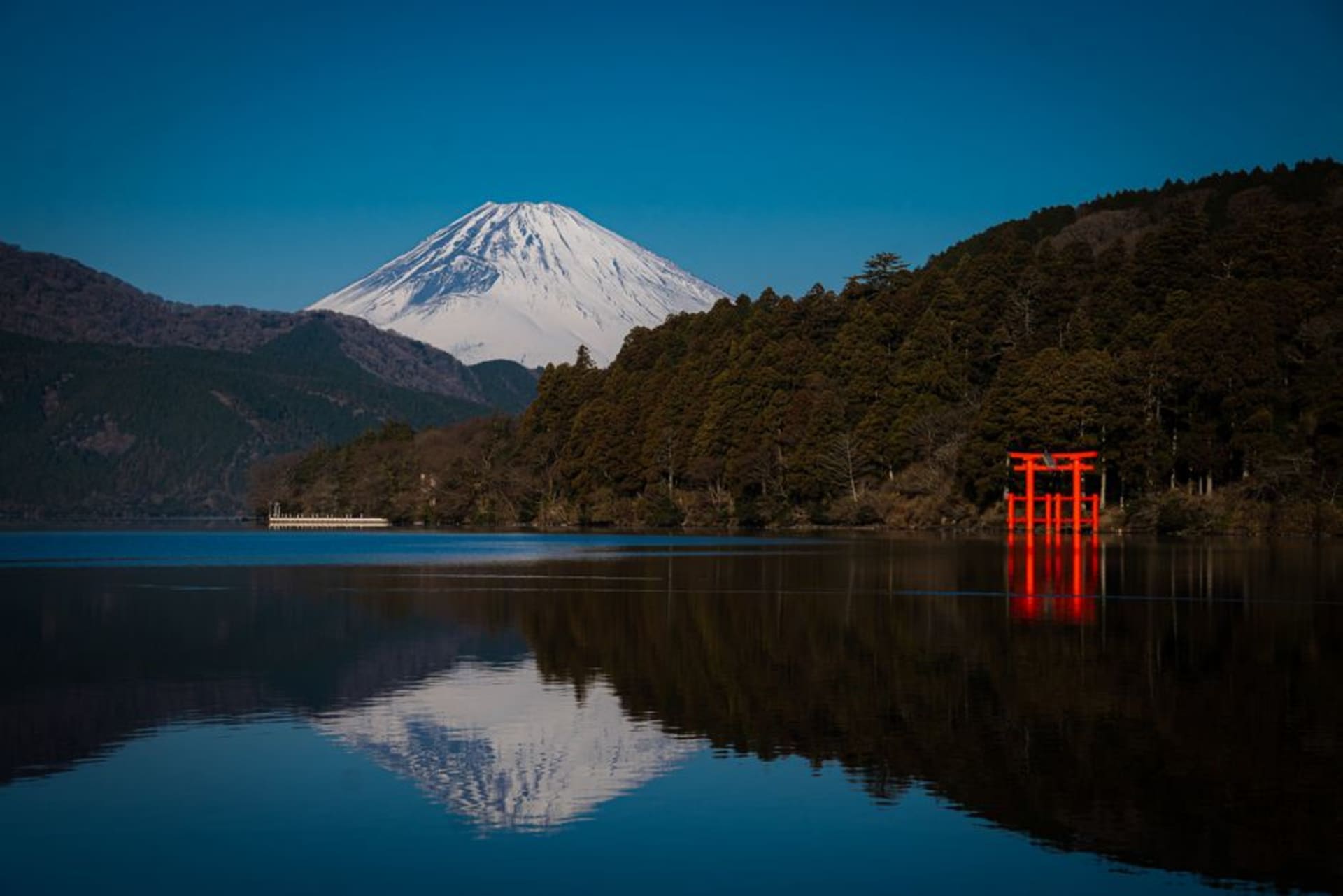 Lake Haruna crater lake below the pointed cone of Mount Haruna-Fuji