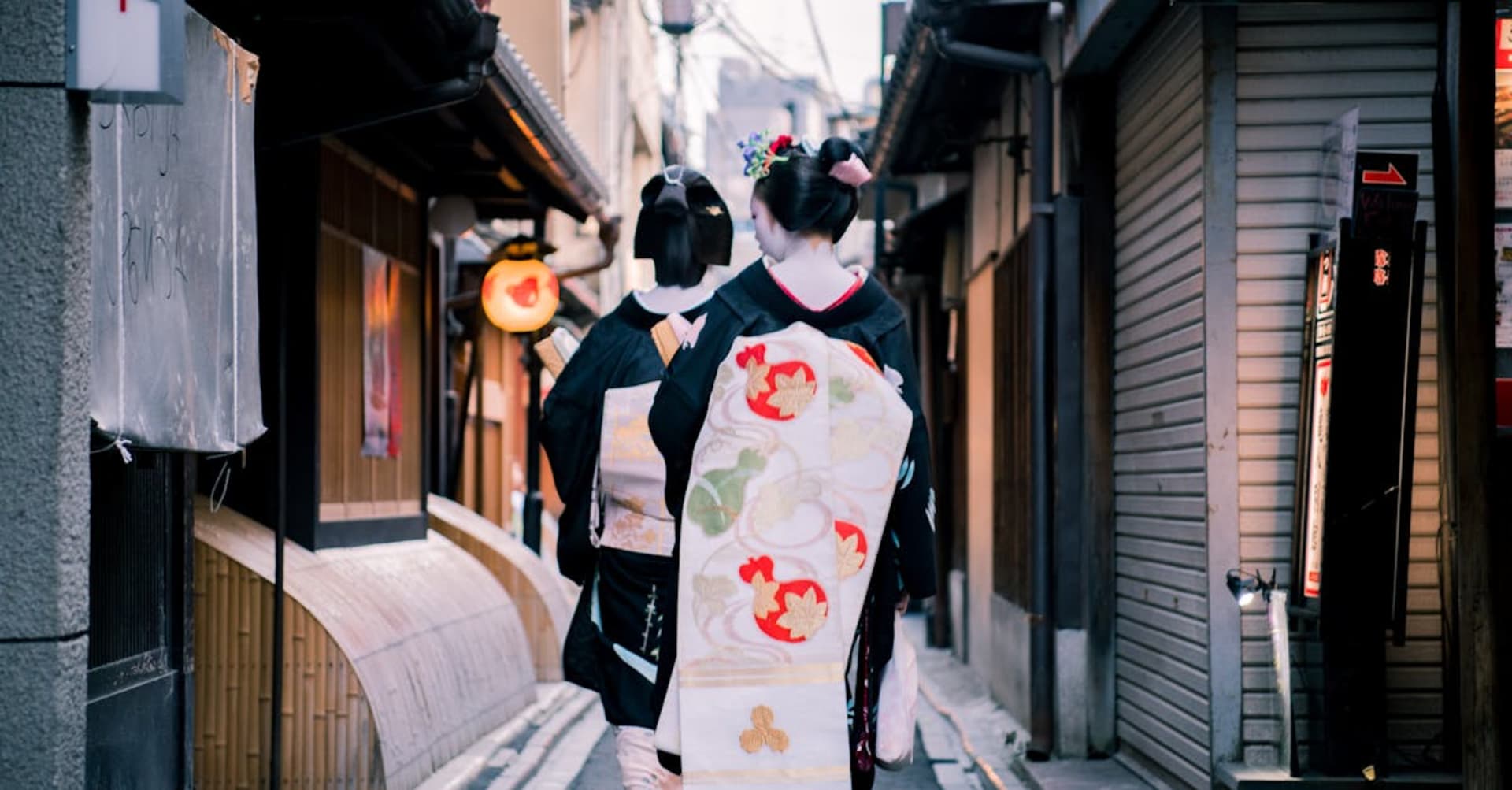 Stone-paved lane of Ninenzaka in Kyoto with traditional wooden buildings