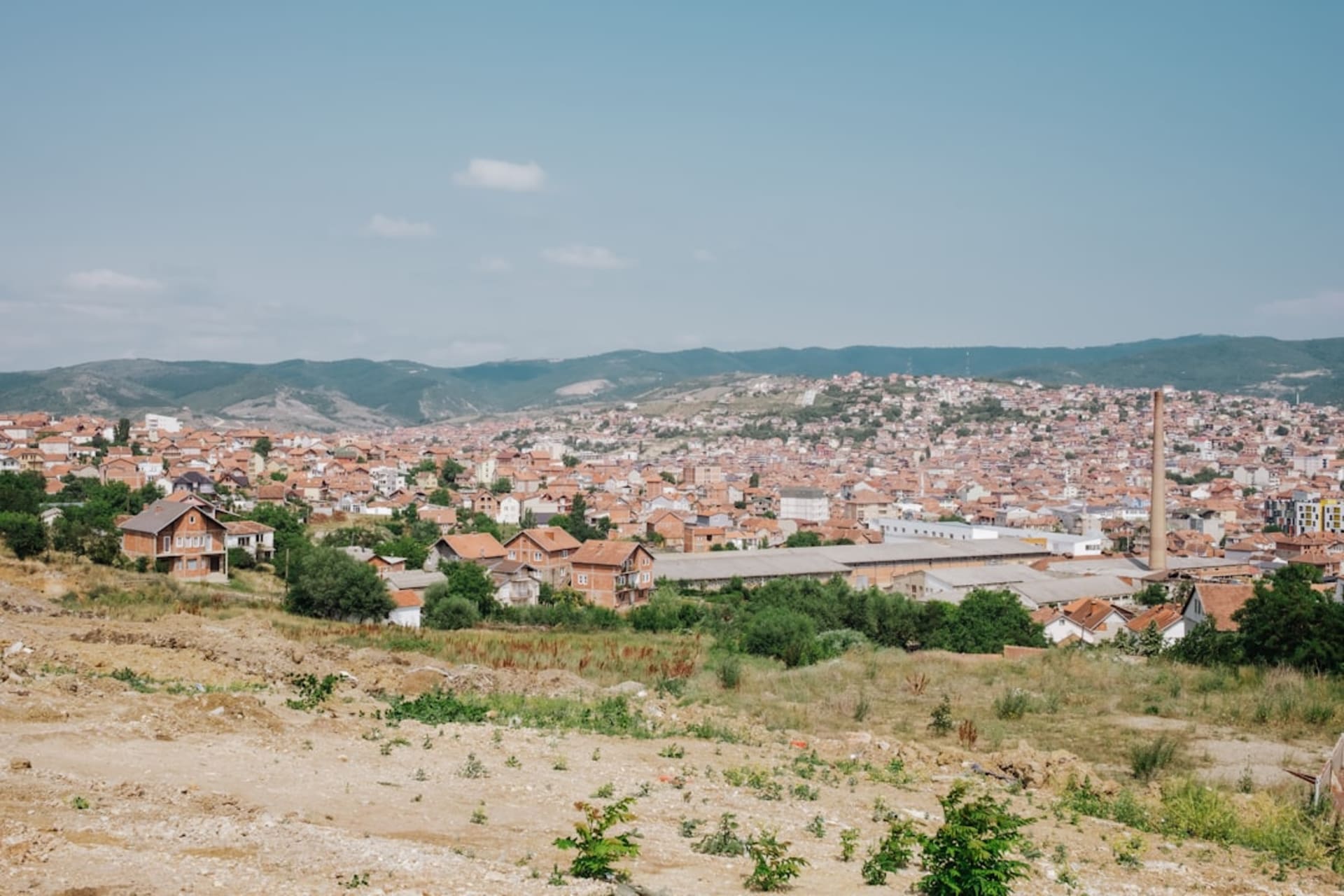 The ruined stone walls and towers of Novo Brdo Fortress on its hilltop above eastern Kosovo