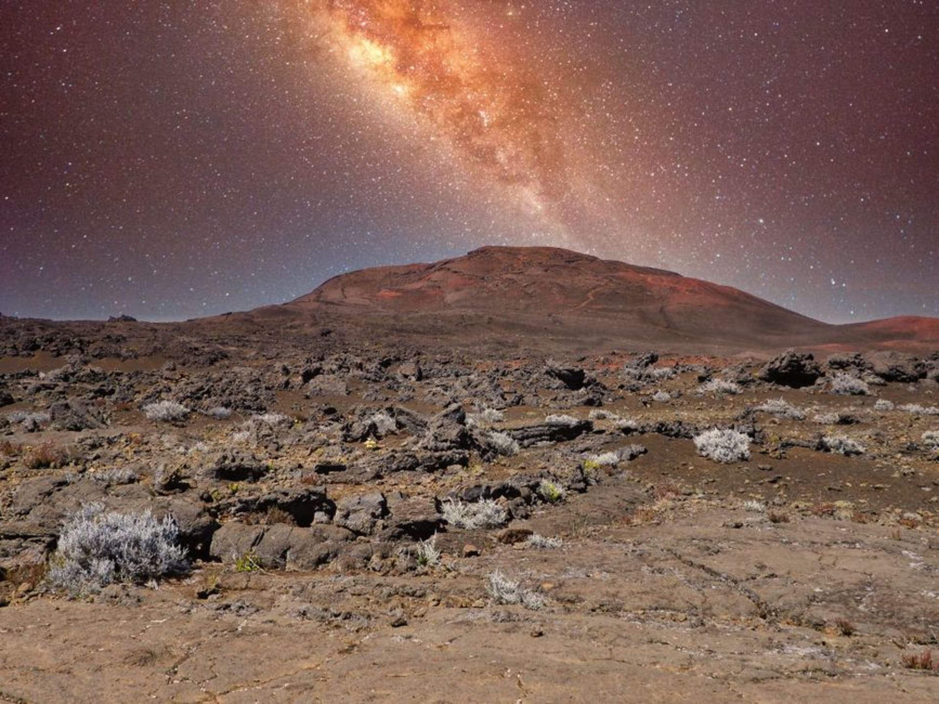 Volcanic cinder cones and black lava fields of the Gran Desierto de Altar at dusk, Sonora