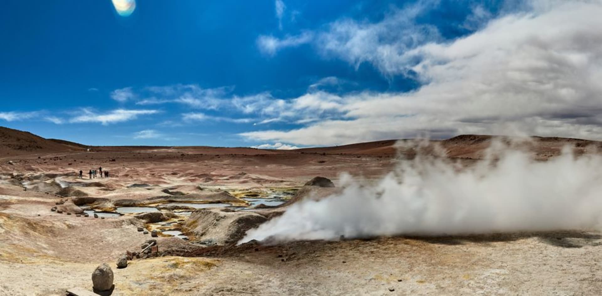 The dry agave-dotted valley around Tecozautla with steam rising from the geothermal field in the distance