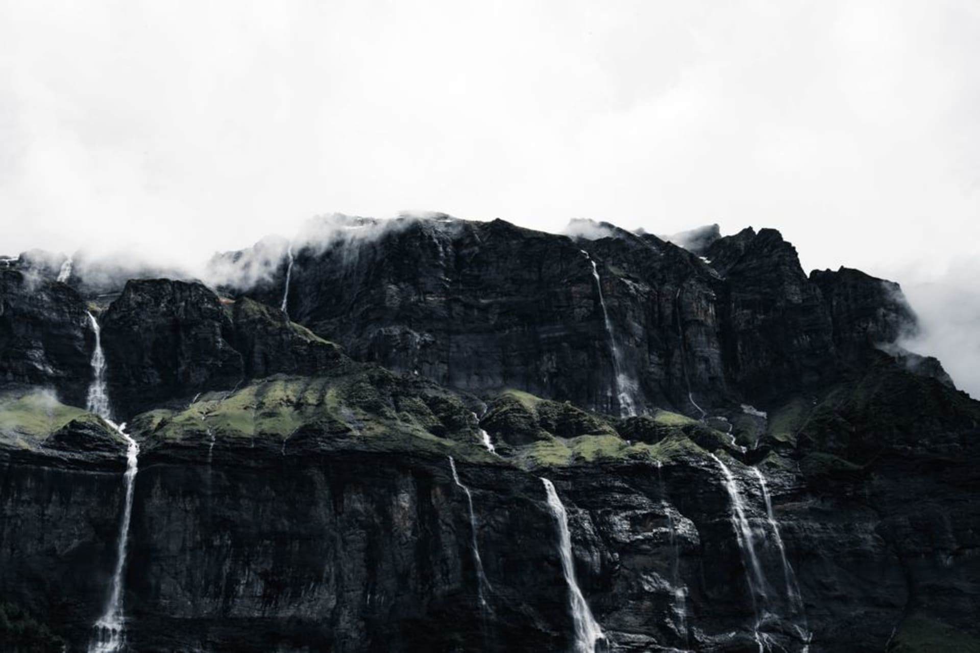The Great Alps Waterfall dropping through dense rainforest in Montserrat's Center Hills