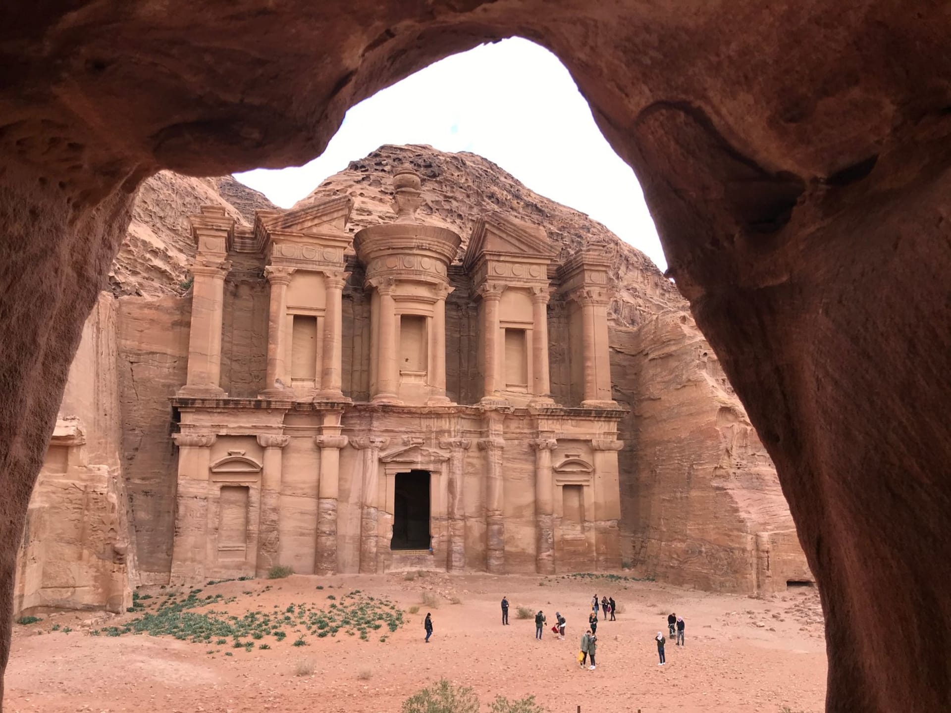 The carved altar platform of the High Place of Sacrifice on Zibb Atuf mountain above Petra, the city ruins spread below