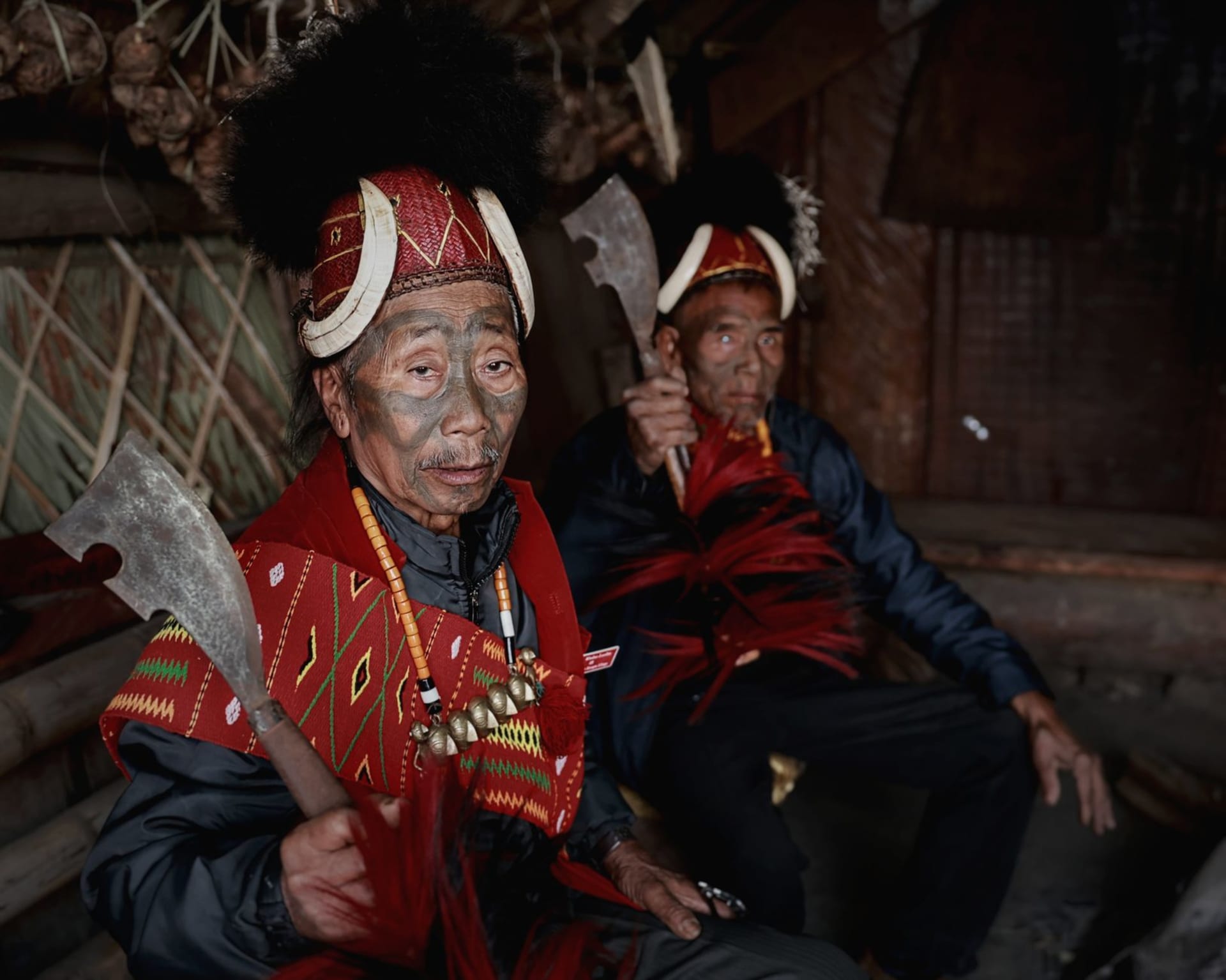 Naga tribal warrior in traditional headdress and beaded regalia at the Hornbill Festival in Kohima, Nagaland