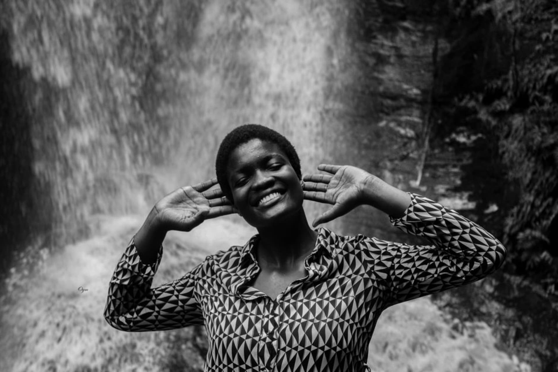 Erin Ijesha Waterfalls cascading down rocky tiers through green forest in Osun State, Nigeria