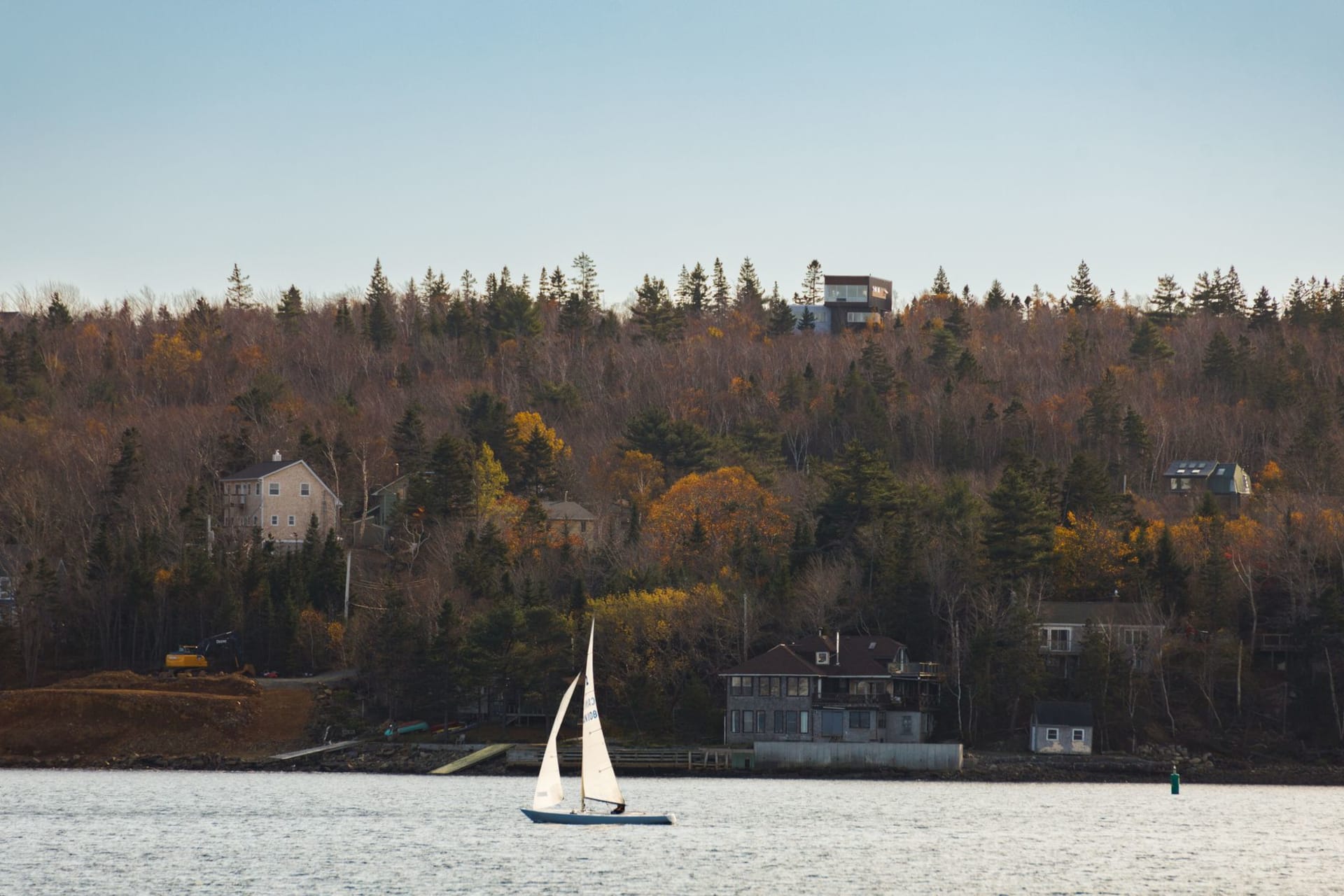 Fort Anne earthworks and 18th century powder magazine at Annapolis Royal bathed in warm autumn light