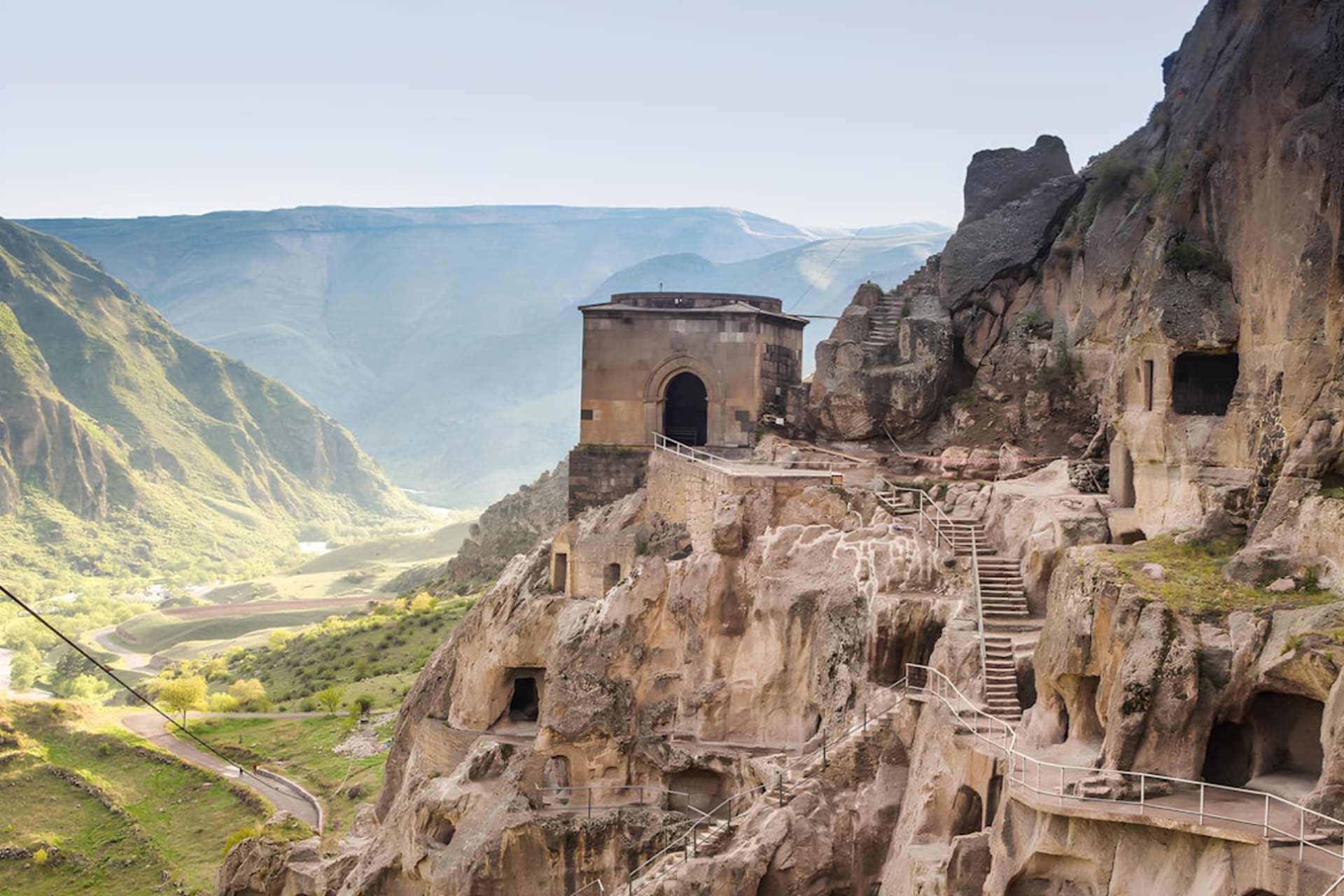 The cone-shaped hill of Herodium rising above the Judean Desert hills near Bethlehem