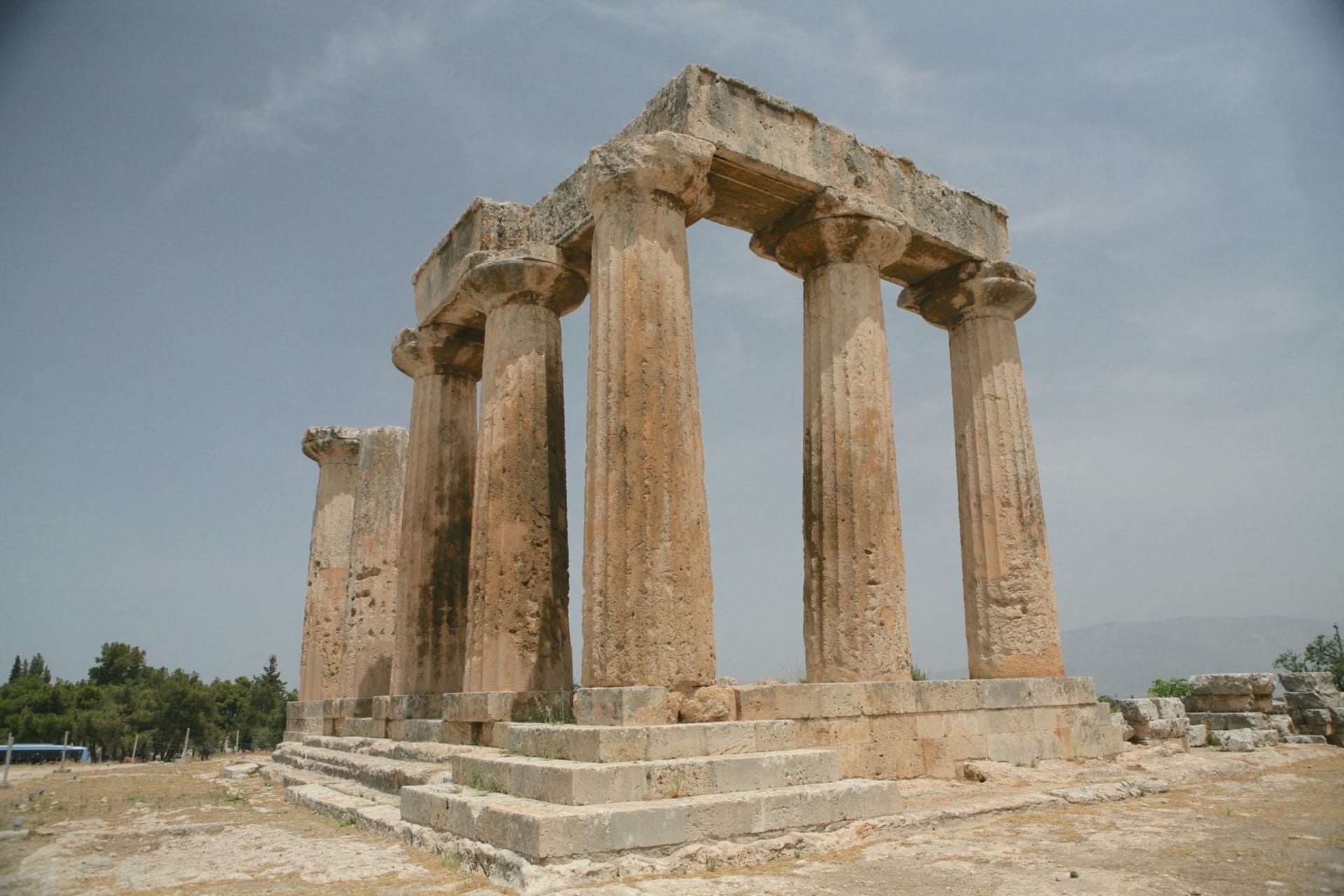 The Lion Gate at Mycenae with its massive lintel stone and carved relief of two lions flanking a pillar at dawn