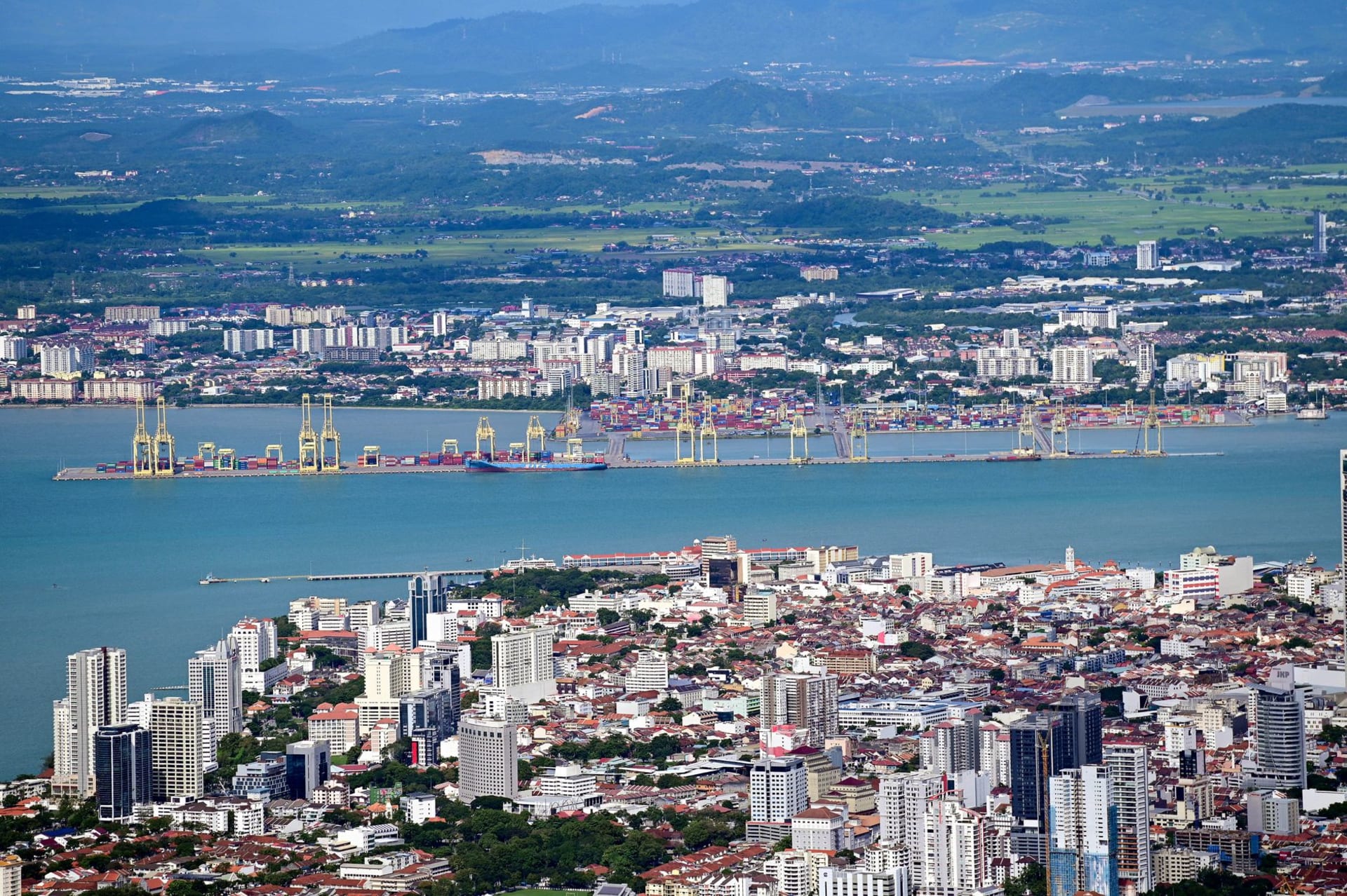 Kek Lok Si Buddhist temple rising in tiers of pagodas and shrines up a forested hillside in Air Itam, Penang